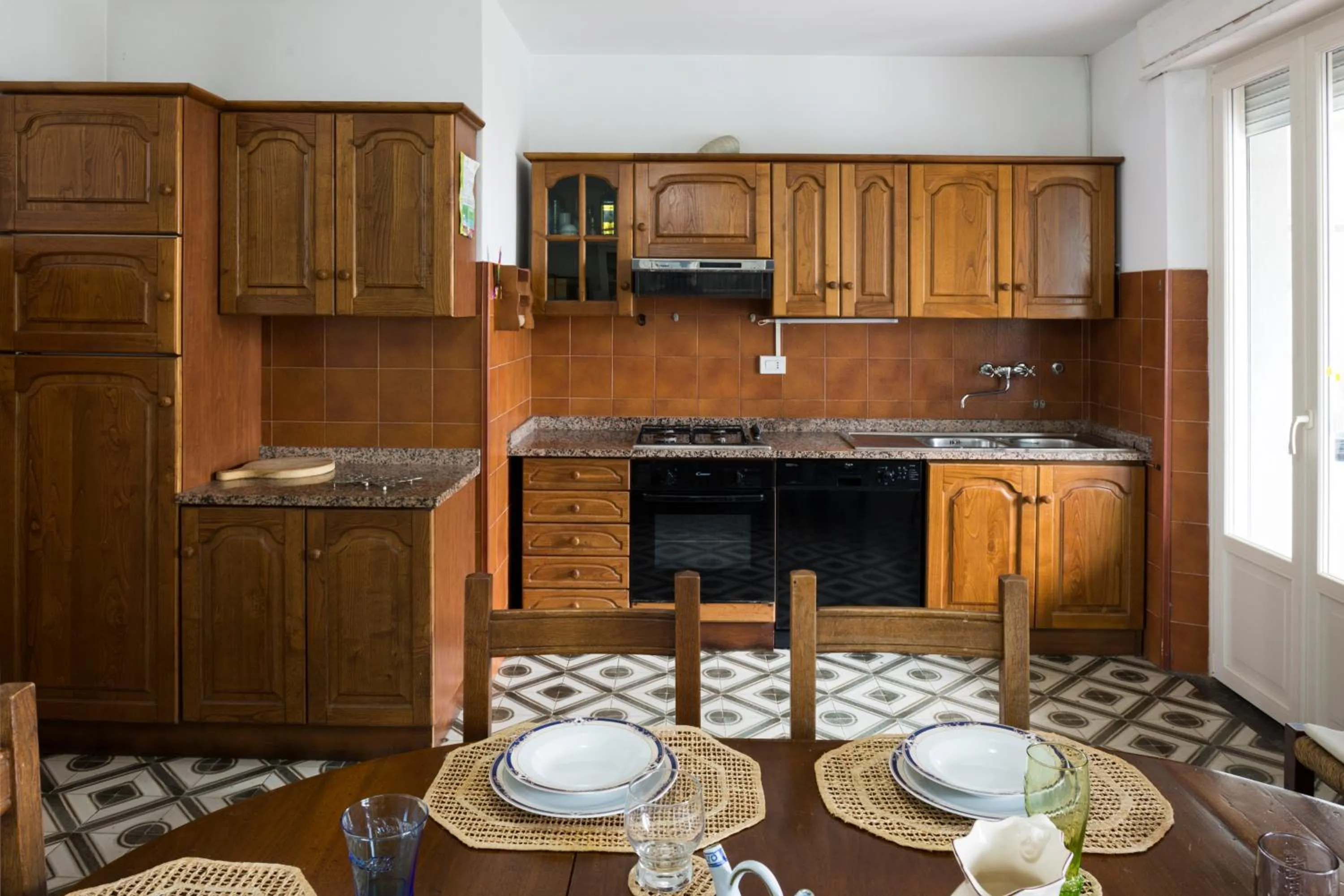 Kitchen or kitchenette in Casa Adriana