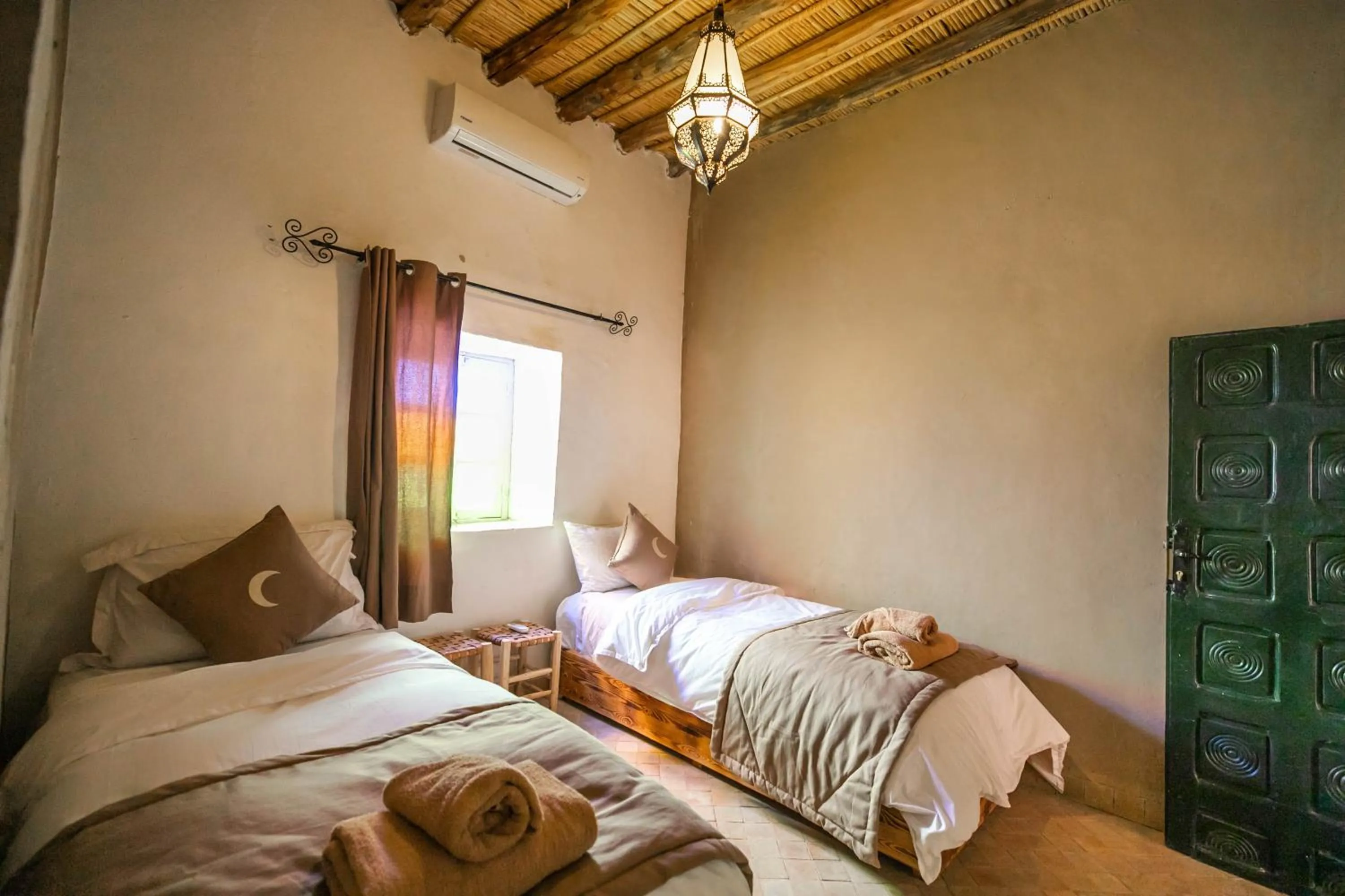 Bed in Riad Kasbah Aiour