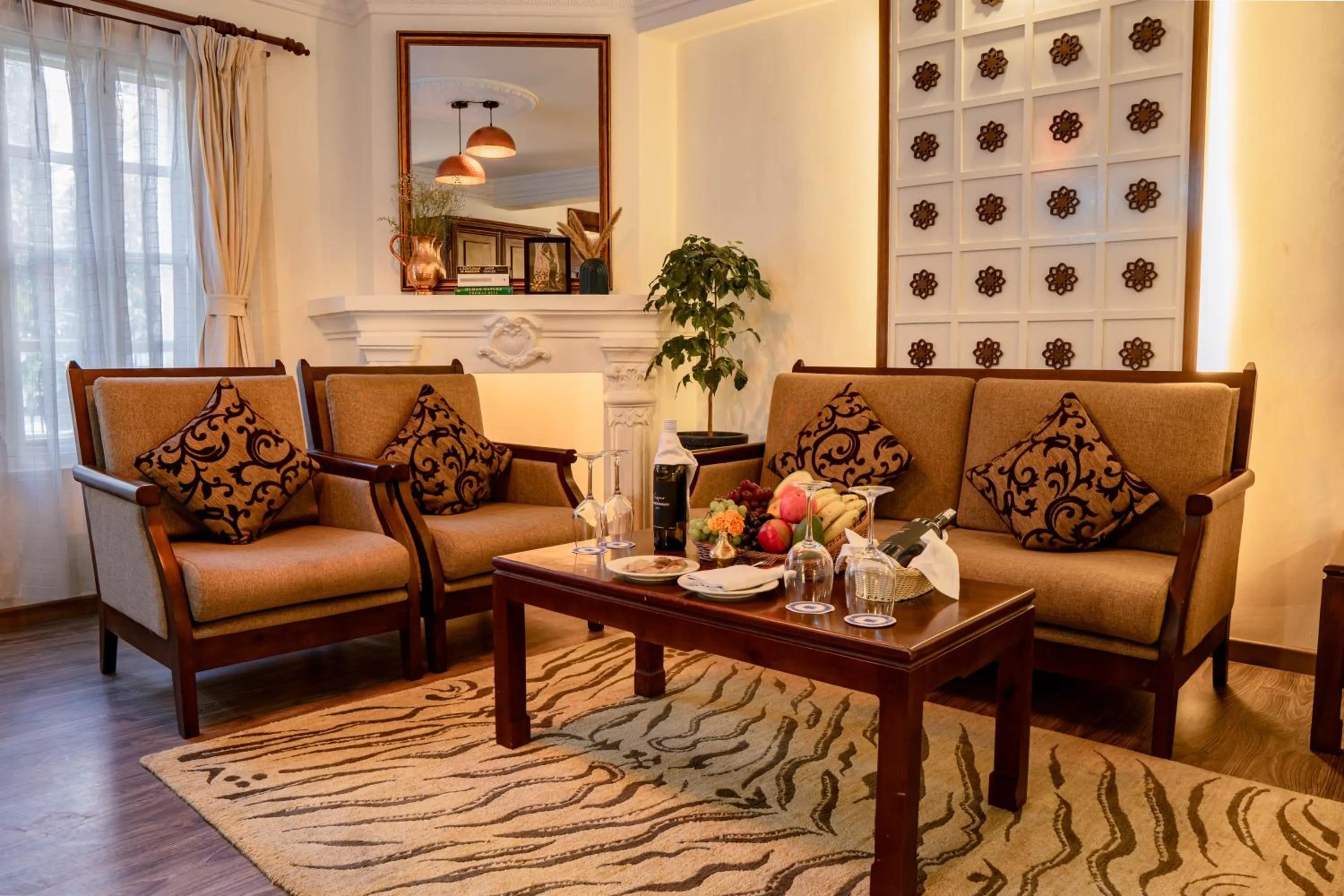 Seating area in Maya Manor Boutique Hotel by KGH Group