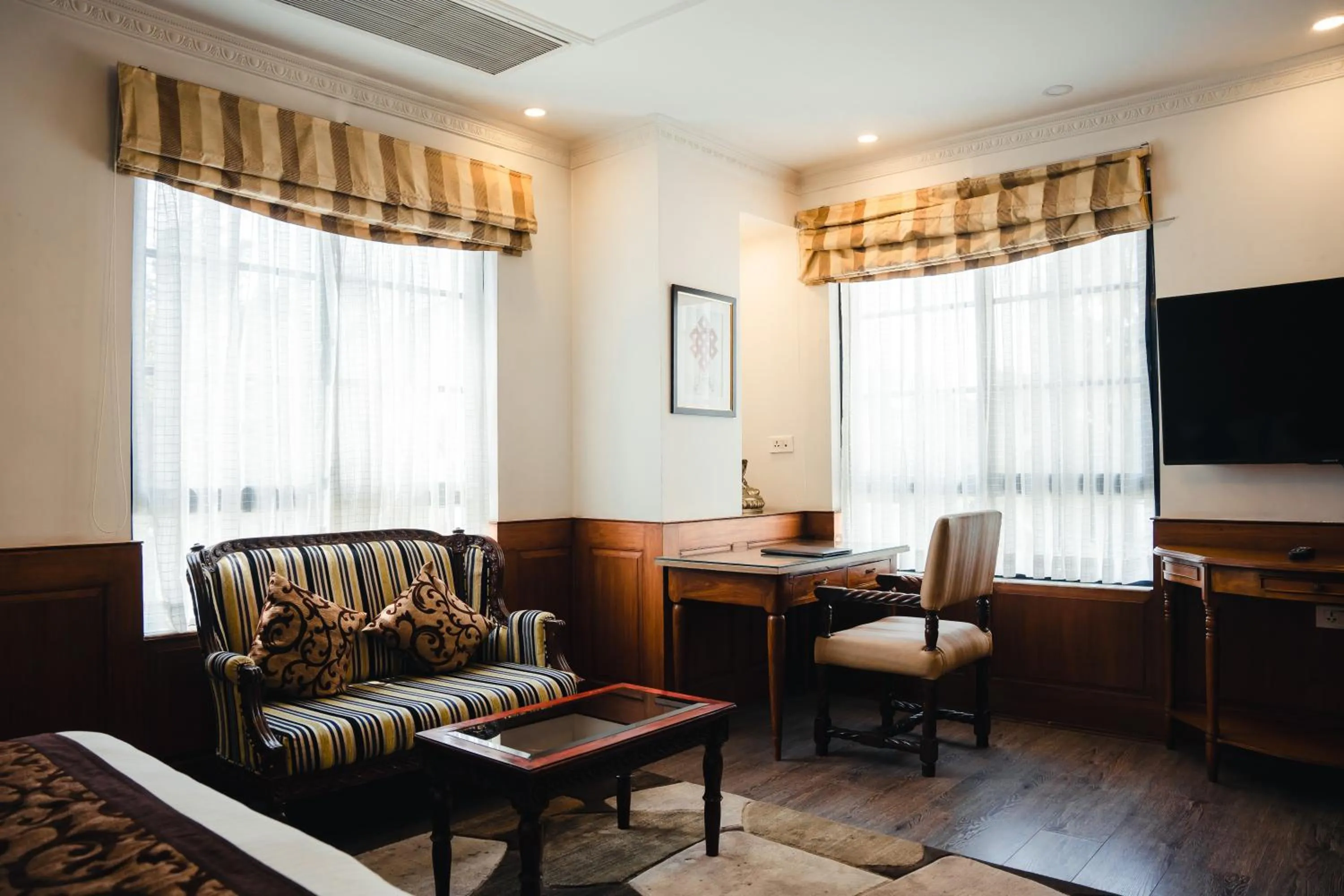 TV and multimedia in Maya Manor Boutique Hotel by KGH Group