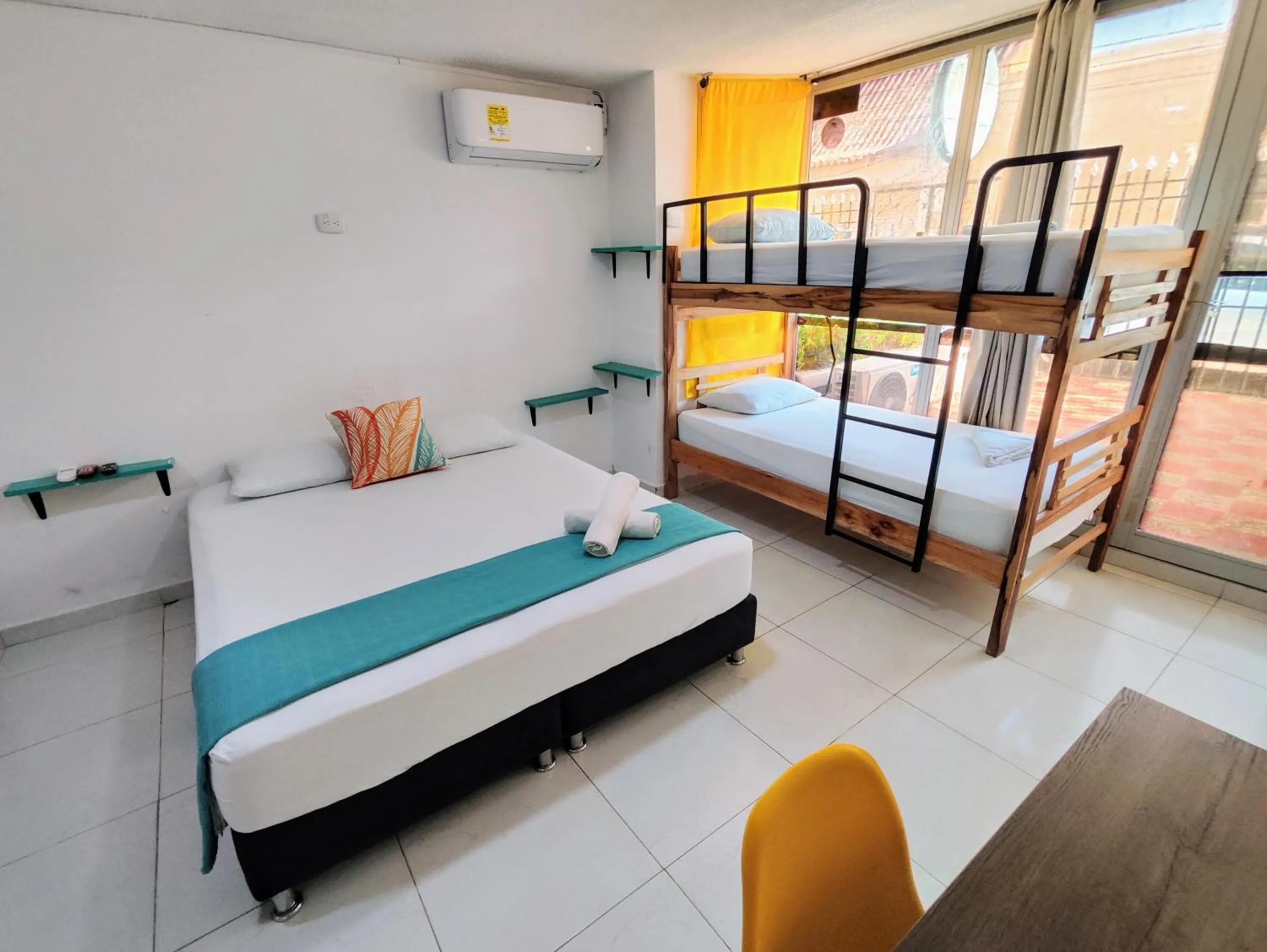 Bed in Bona Vida Hotel