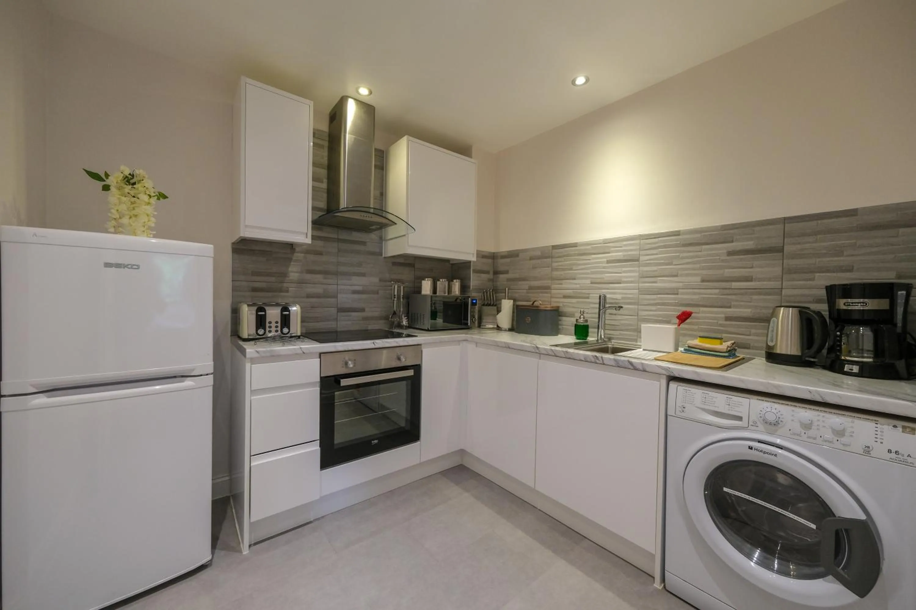 Kitchen or kitchenette in Collingham Serviced Apartments