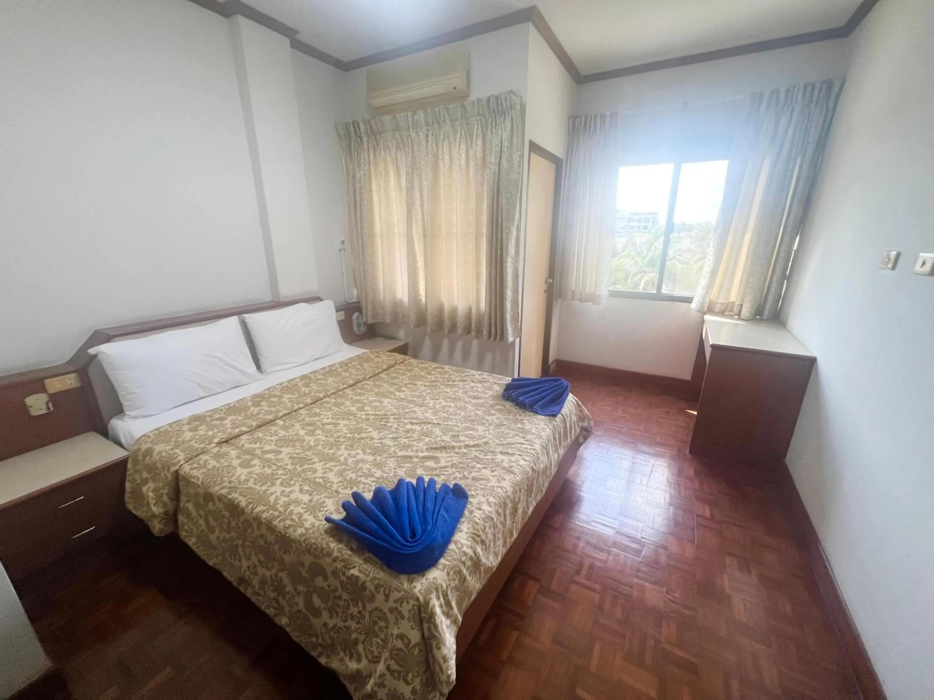 Bed in Muang Thong Family Suite Hatyai