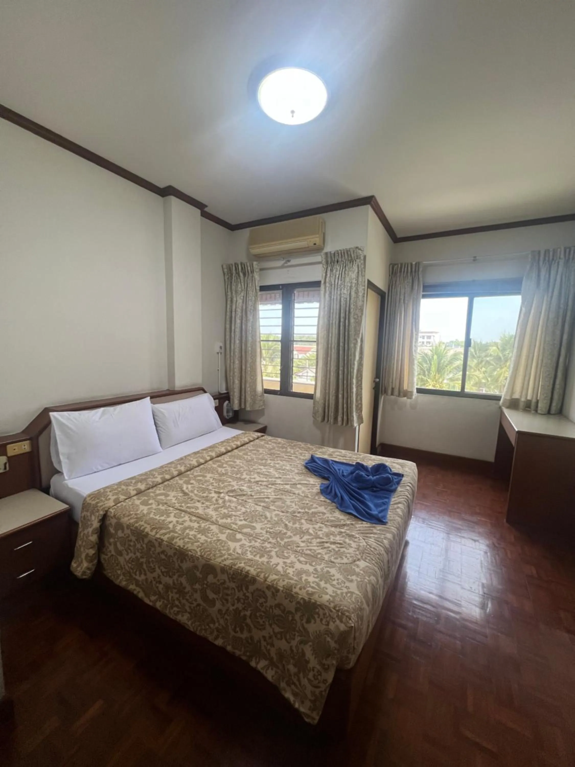 Bed in Muang Thong Family Suite Hatyai