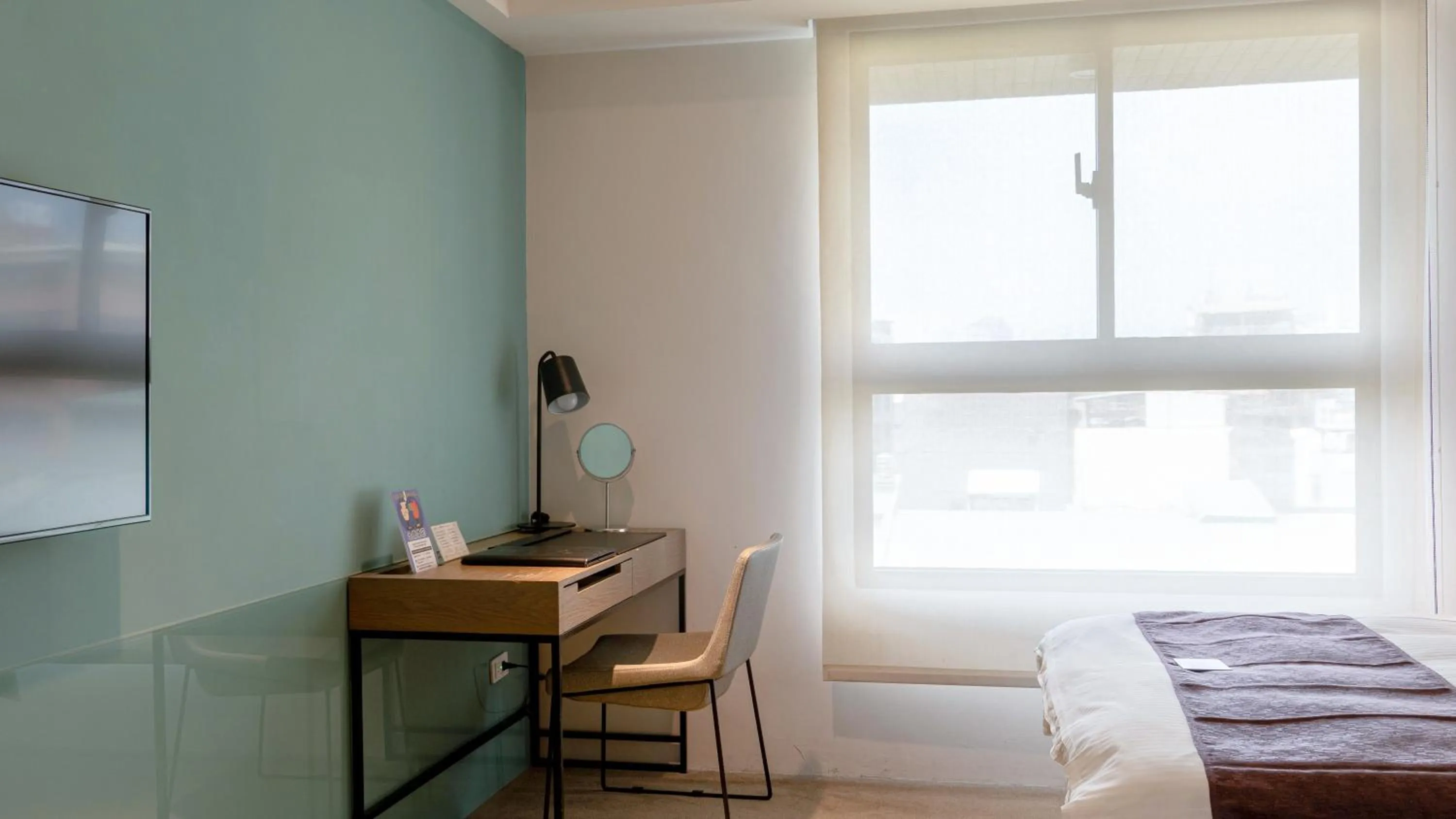 Bedroom, Bed in GOGO Hotel 市政館