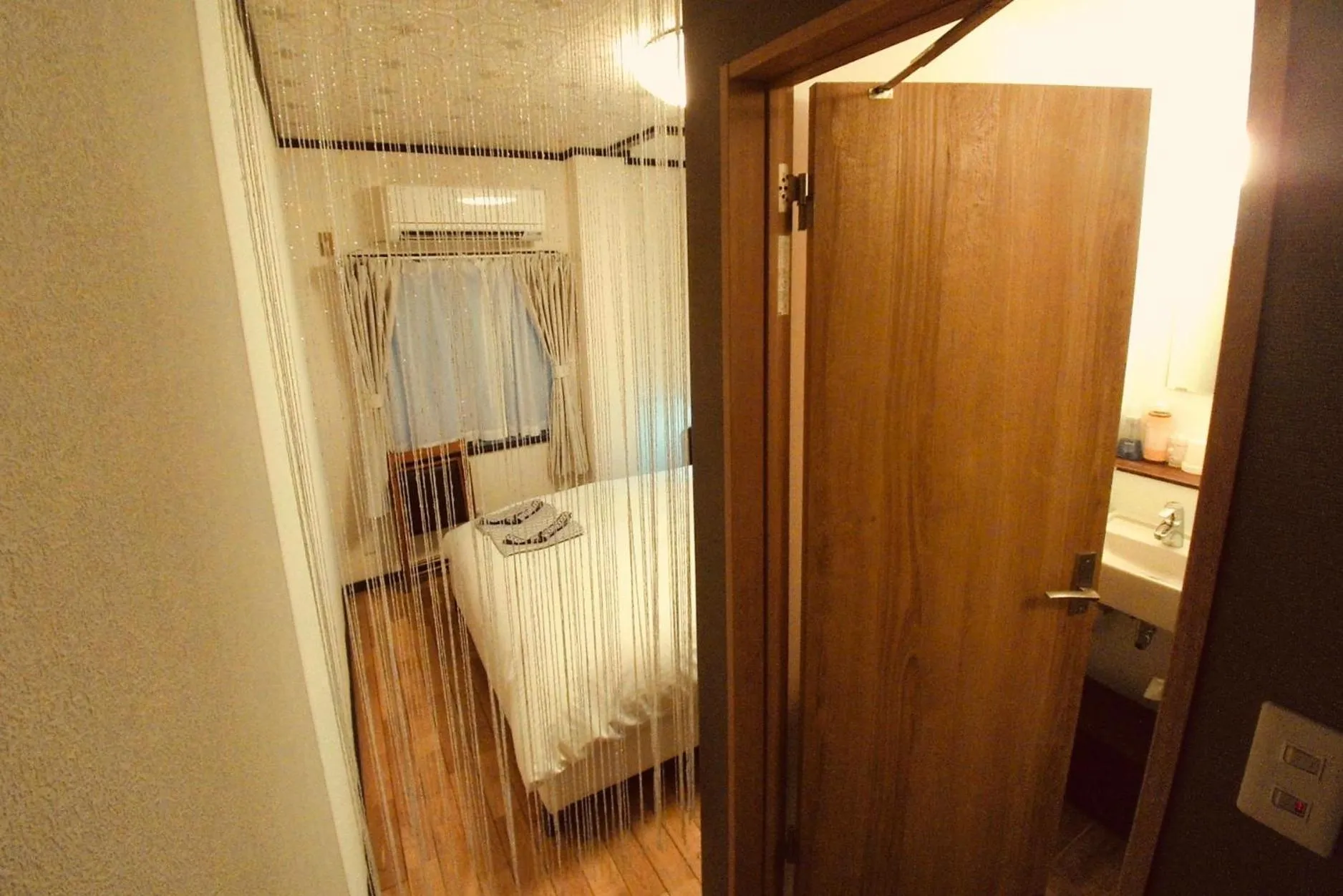 Bathroom, Bed in Uno Port Inn