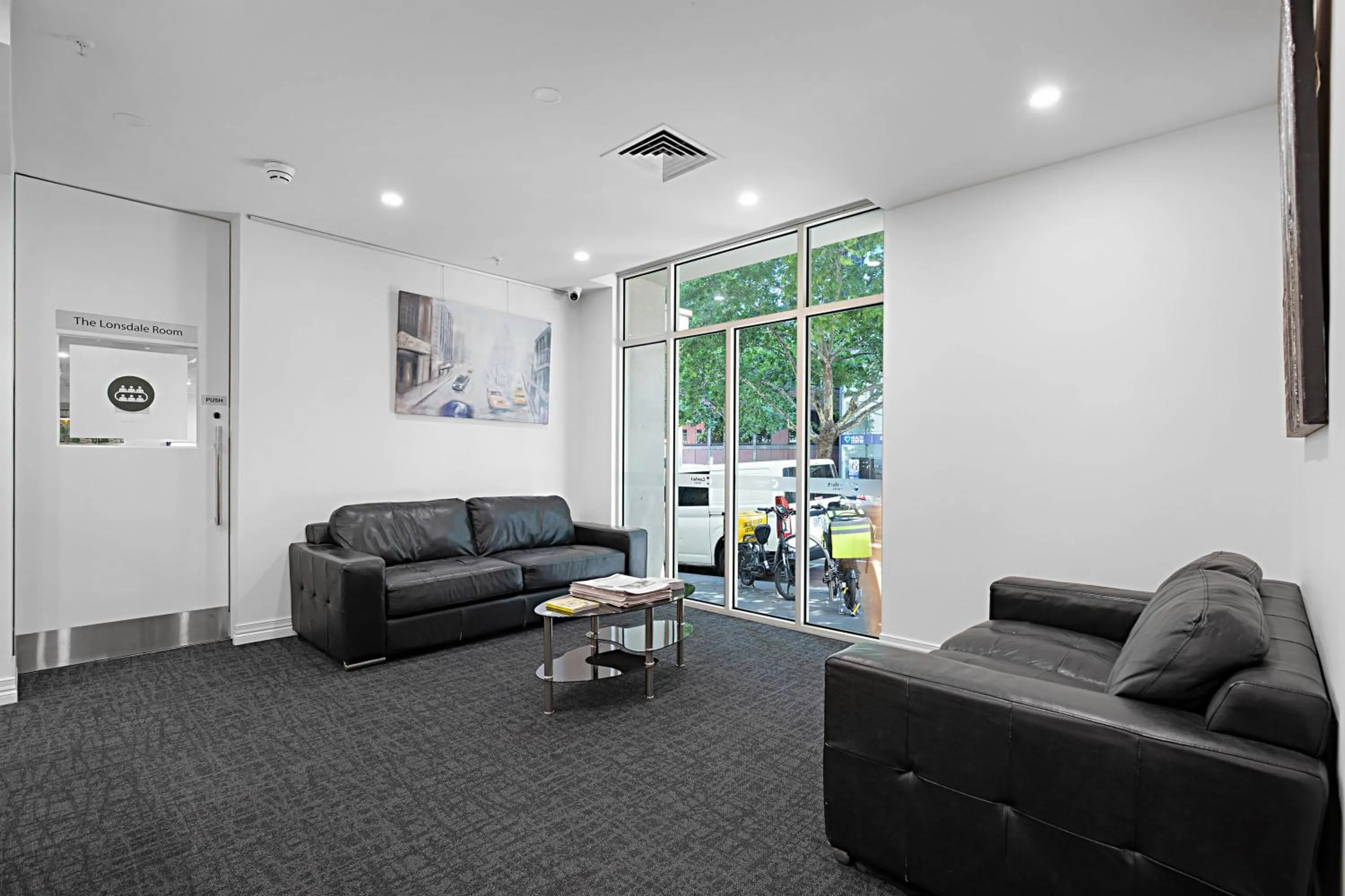 Seating area in Comfort Apartments Melbourne Central