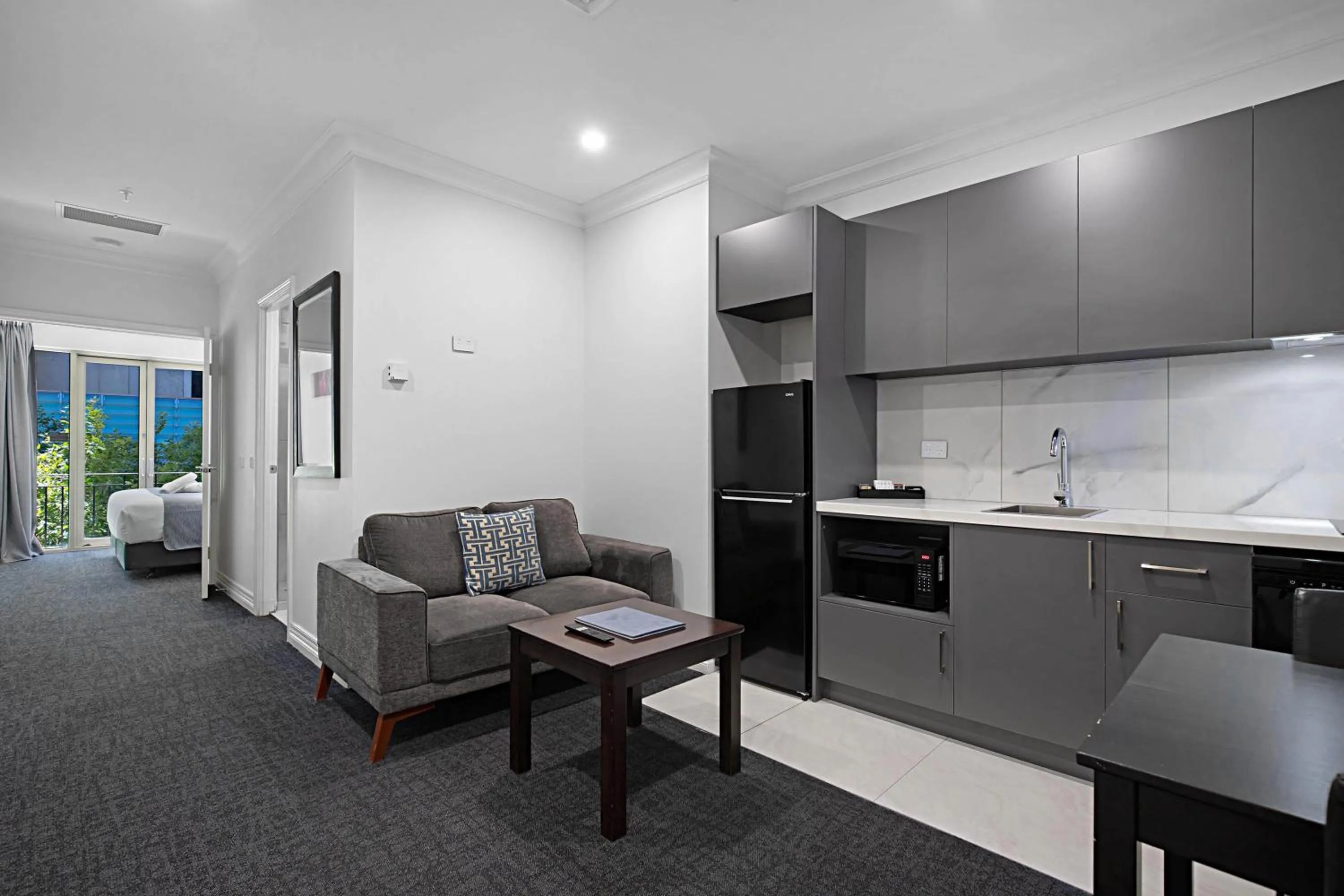 Living room in Comfort Apartments Melbourne Central