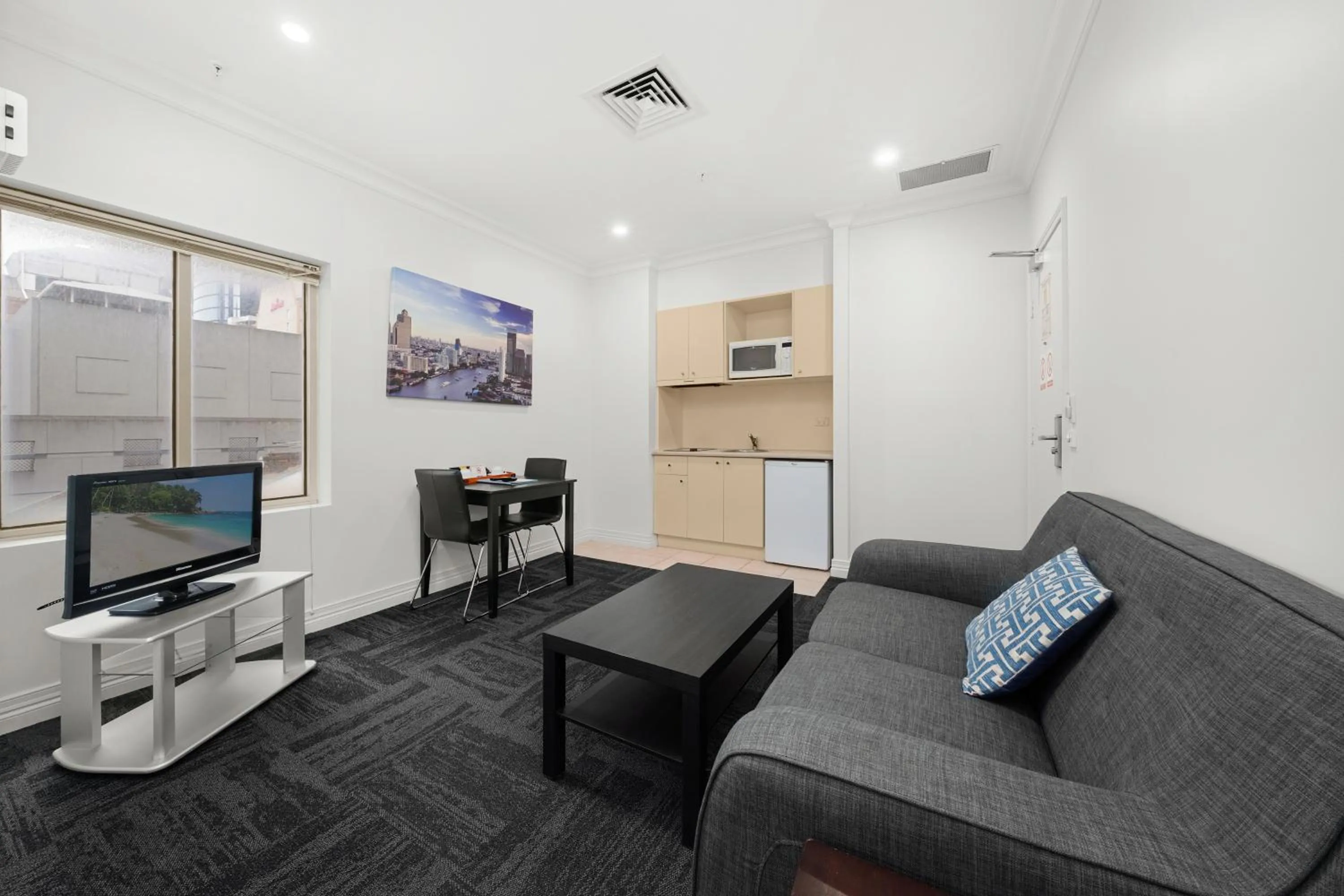 Living room in Comfort Apartments Melbourne Central