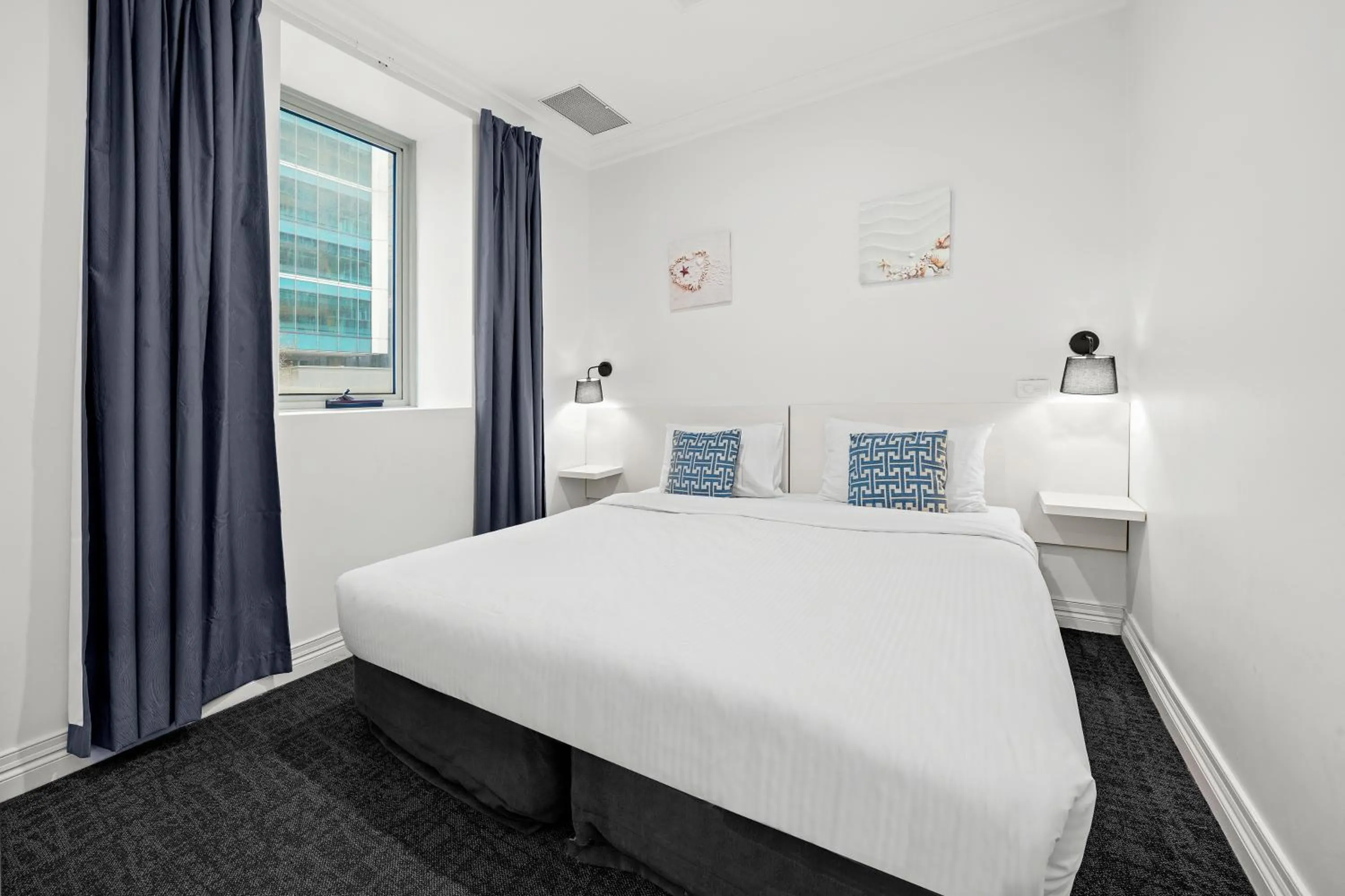 Bed in Comfort Apartments Melbourne Central