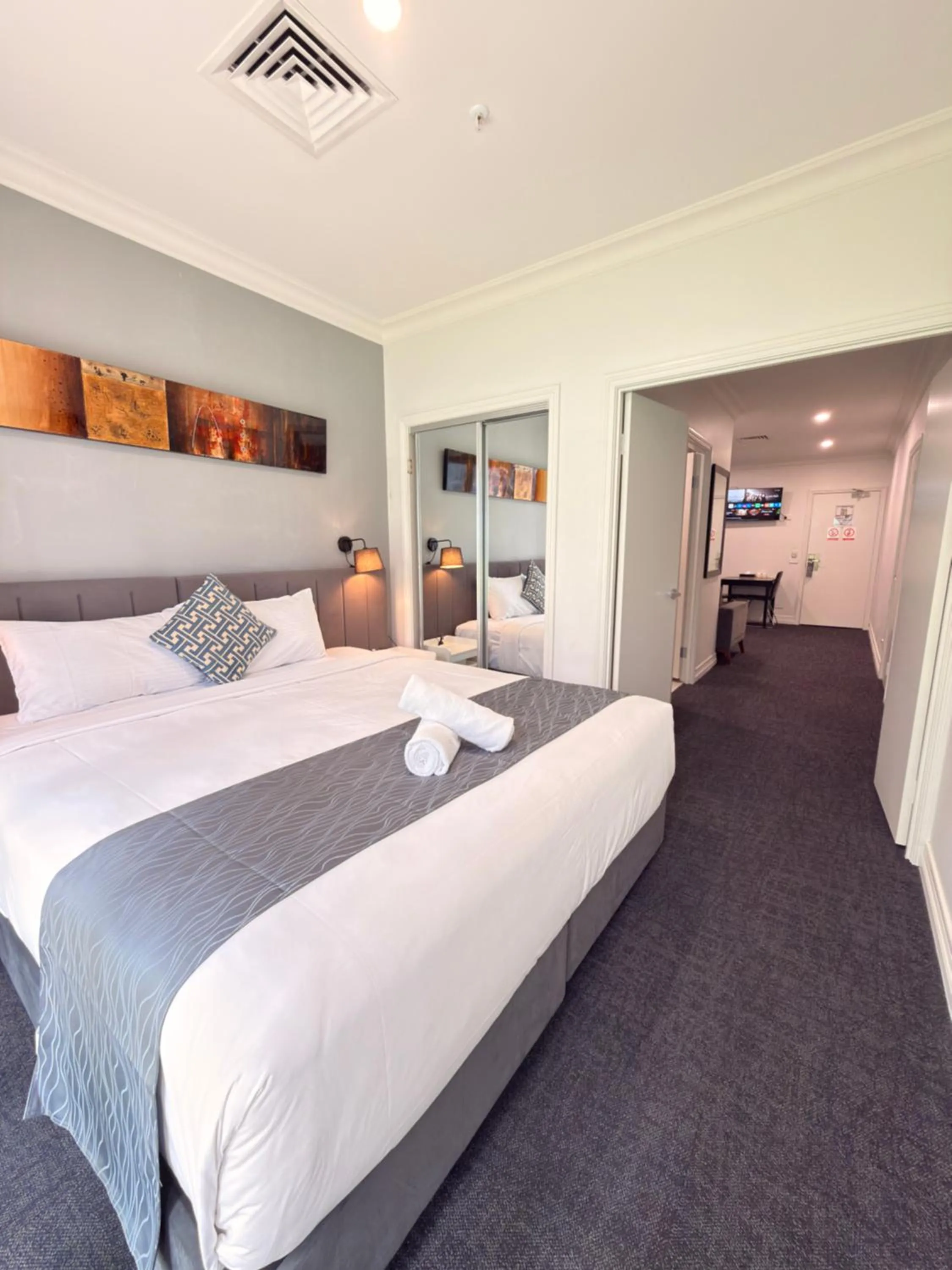 Bed in Comfort Apartments Melbourne Central