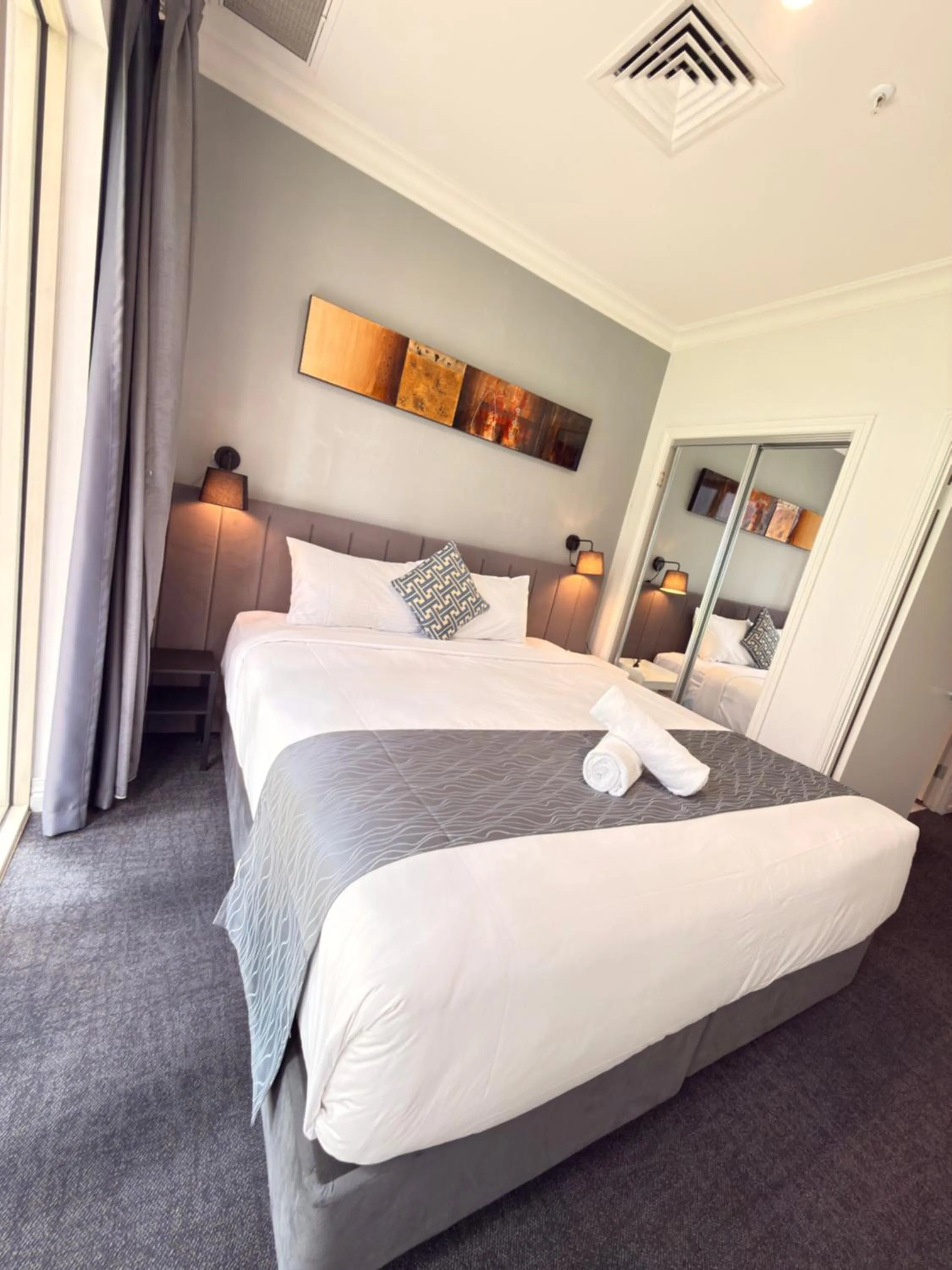 Bed in Comfort Apartments Melbourne Central