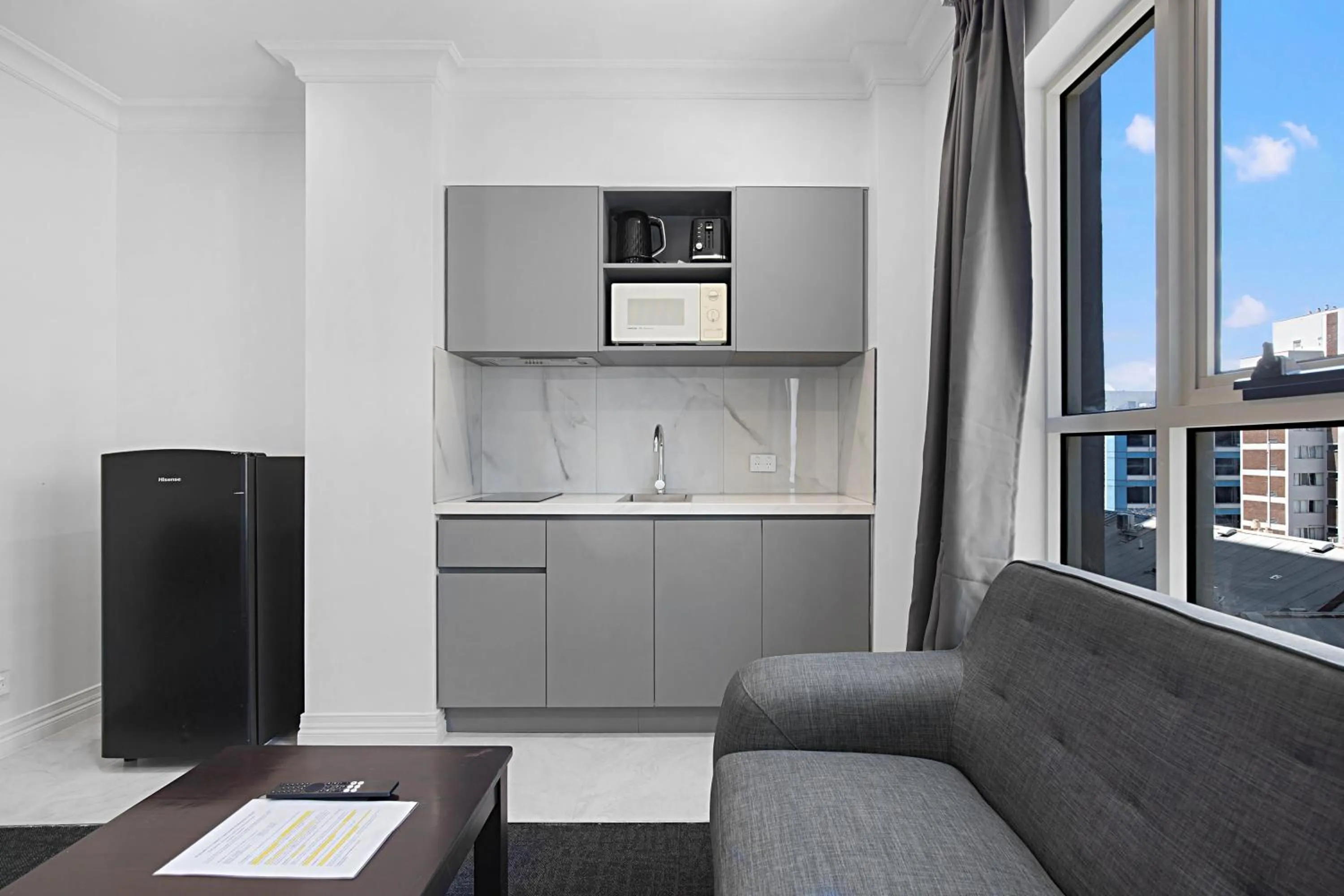 Kitchen or kitchenette in Comfort Apartments Melbourne Central