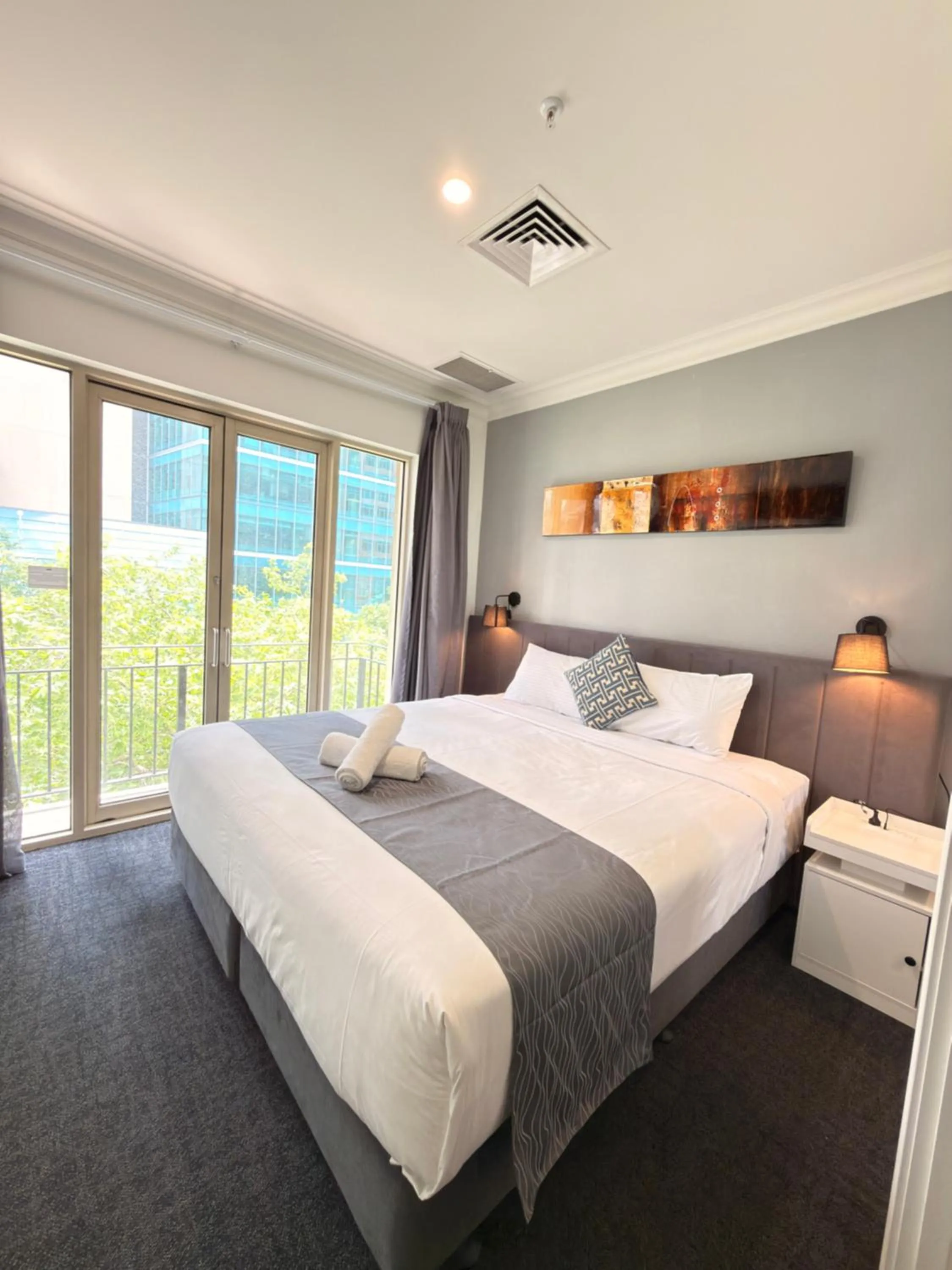 Bed in Comfort Apartments Melbourne Central