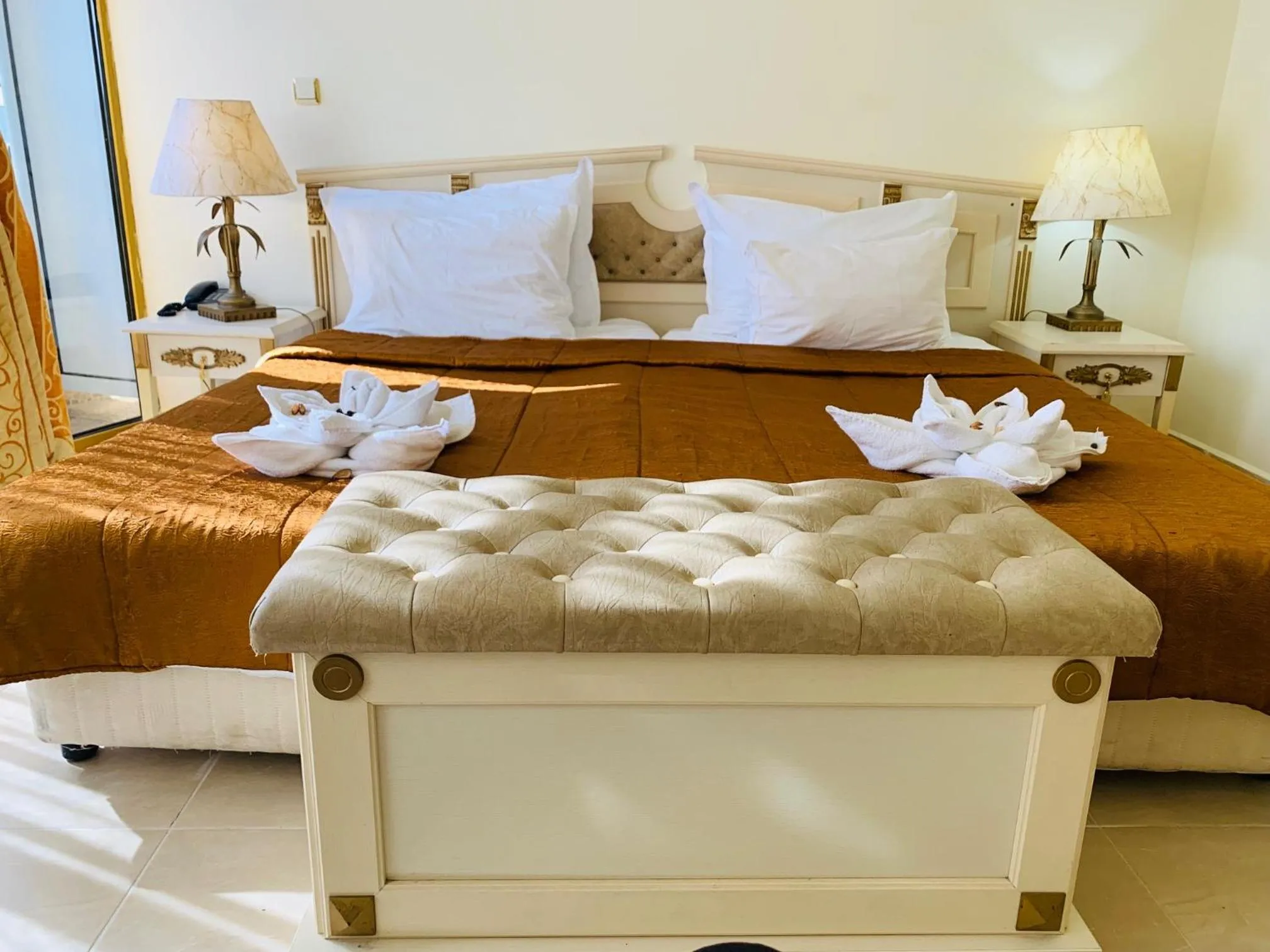 Bed in Imperial Palace Hotel