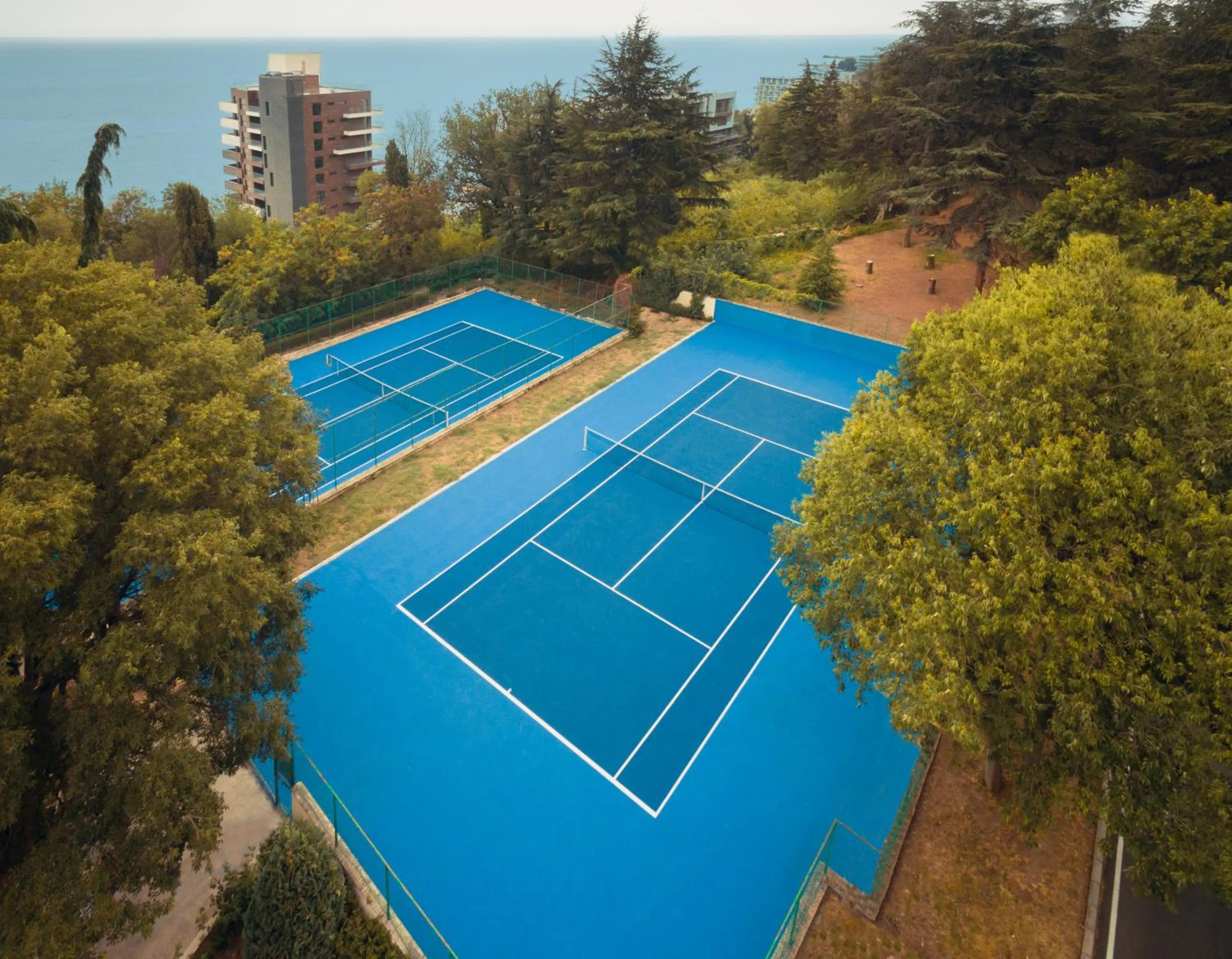 Tennis court in Marina Hotel, Sunny Day