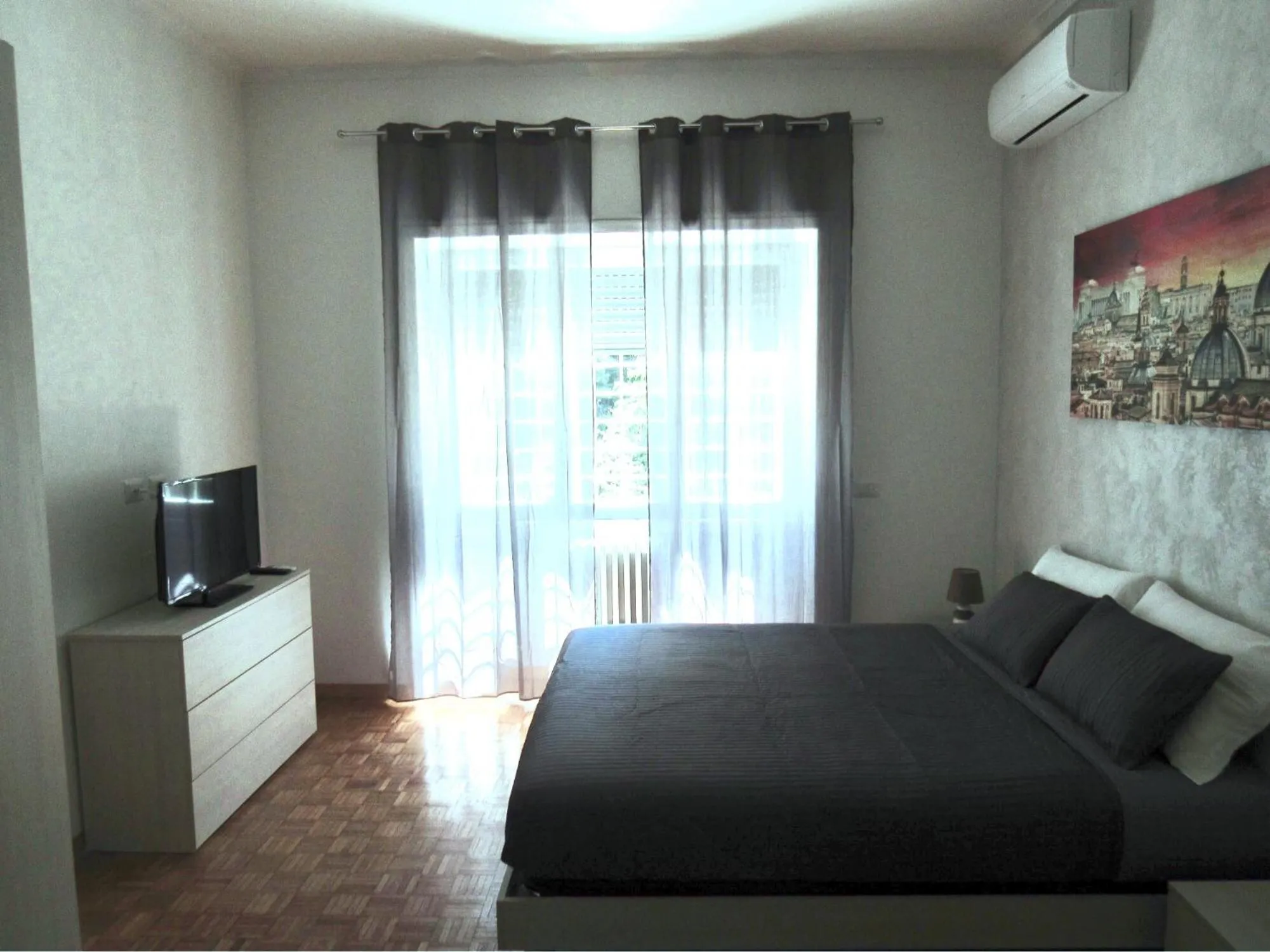 Bed in Roema Guest House