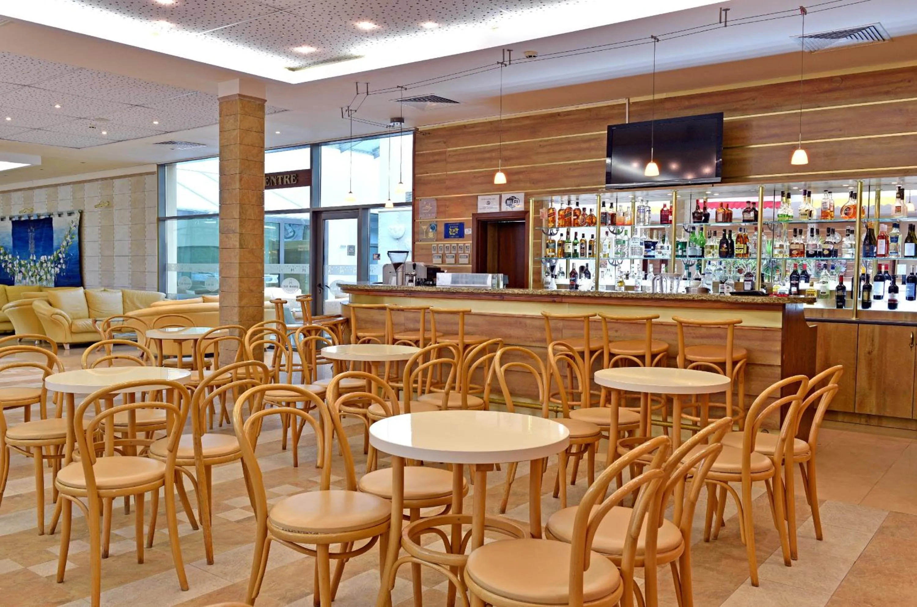 Lounge or bar in Les Magnolias Hotel