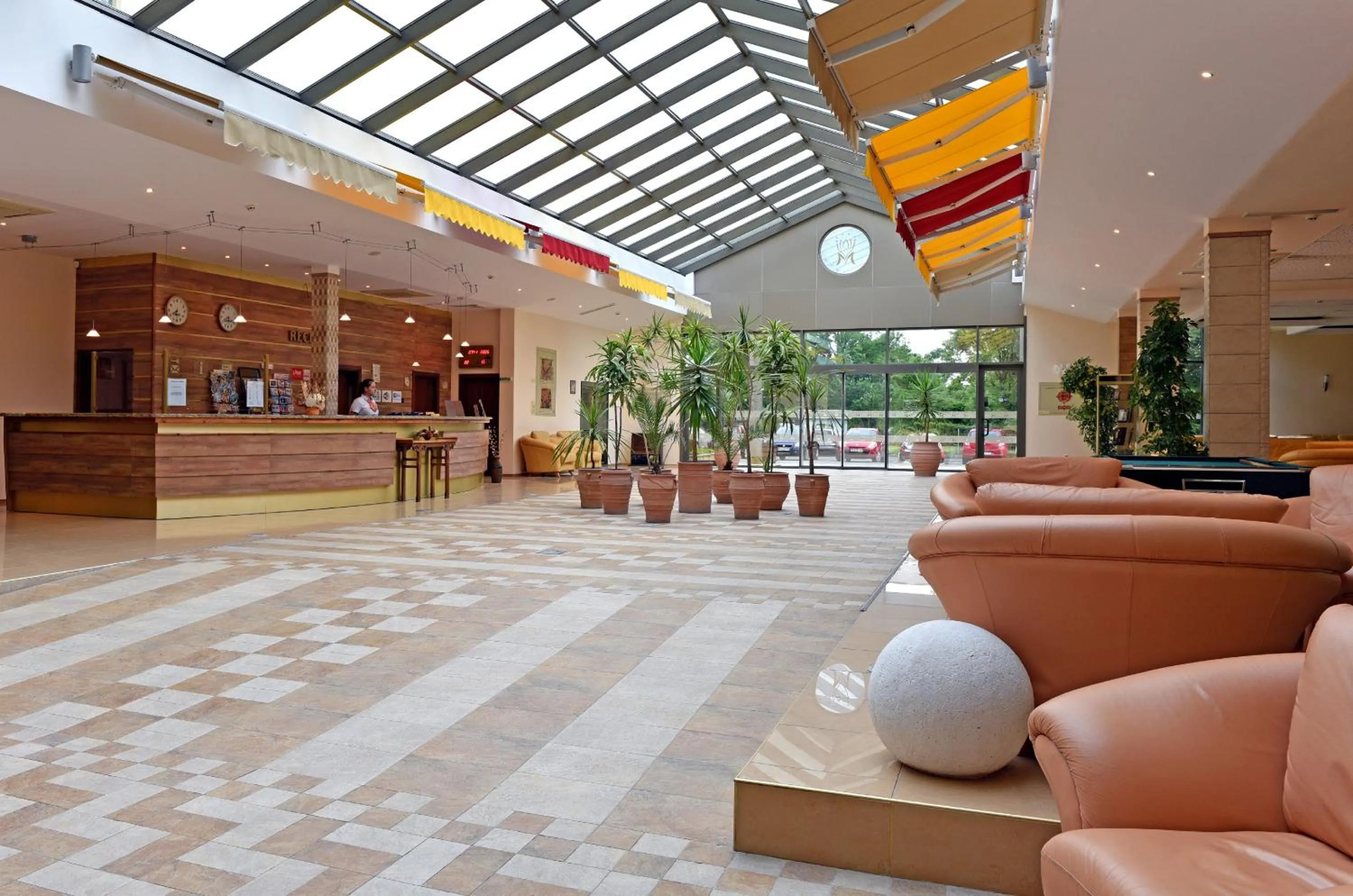 Lobby or reception in Les Magnolias Hotel