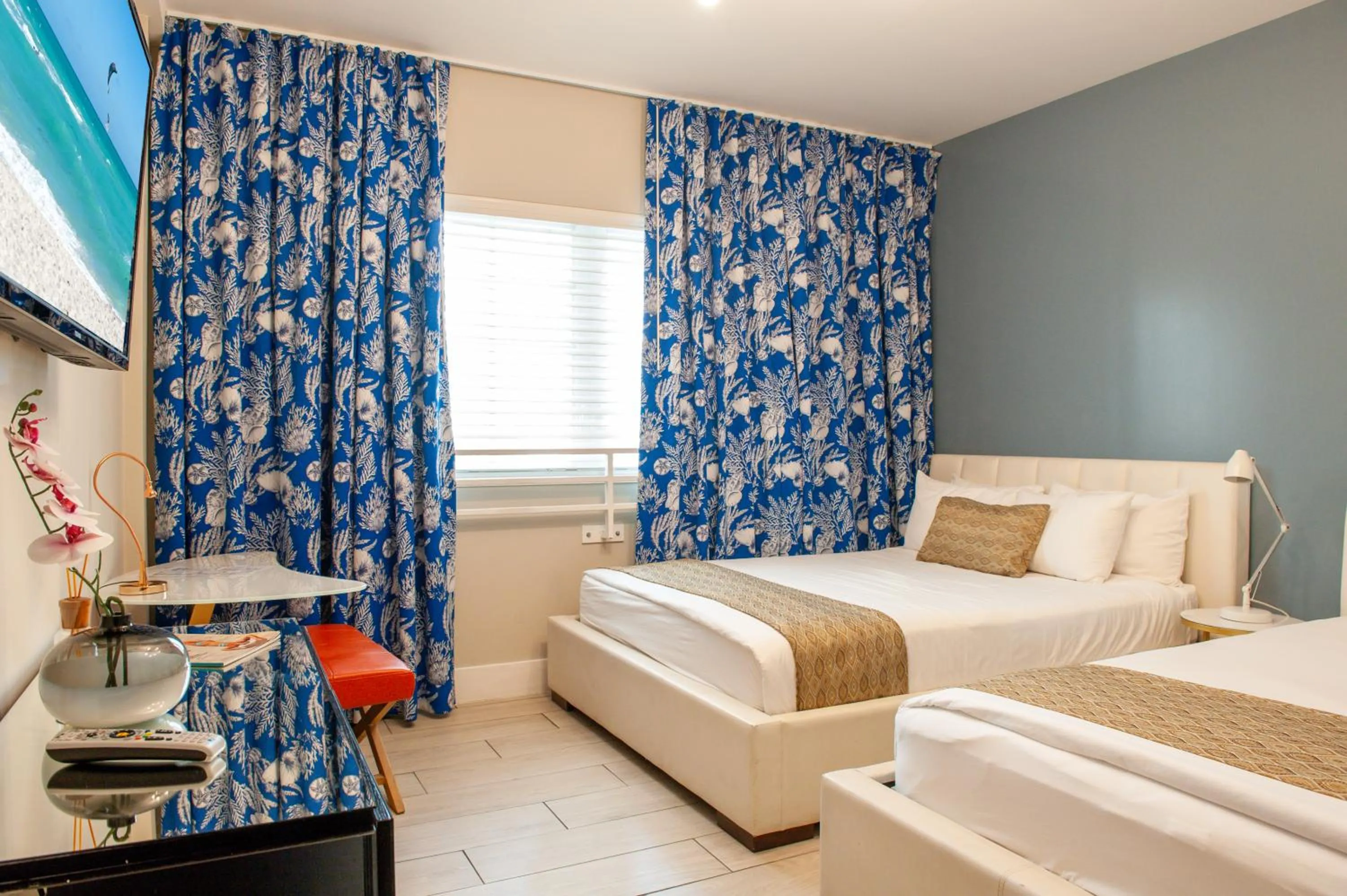 Bed in Oceanside Hotel and Suites