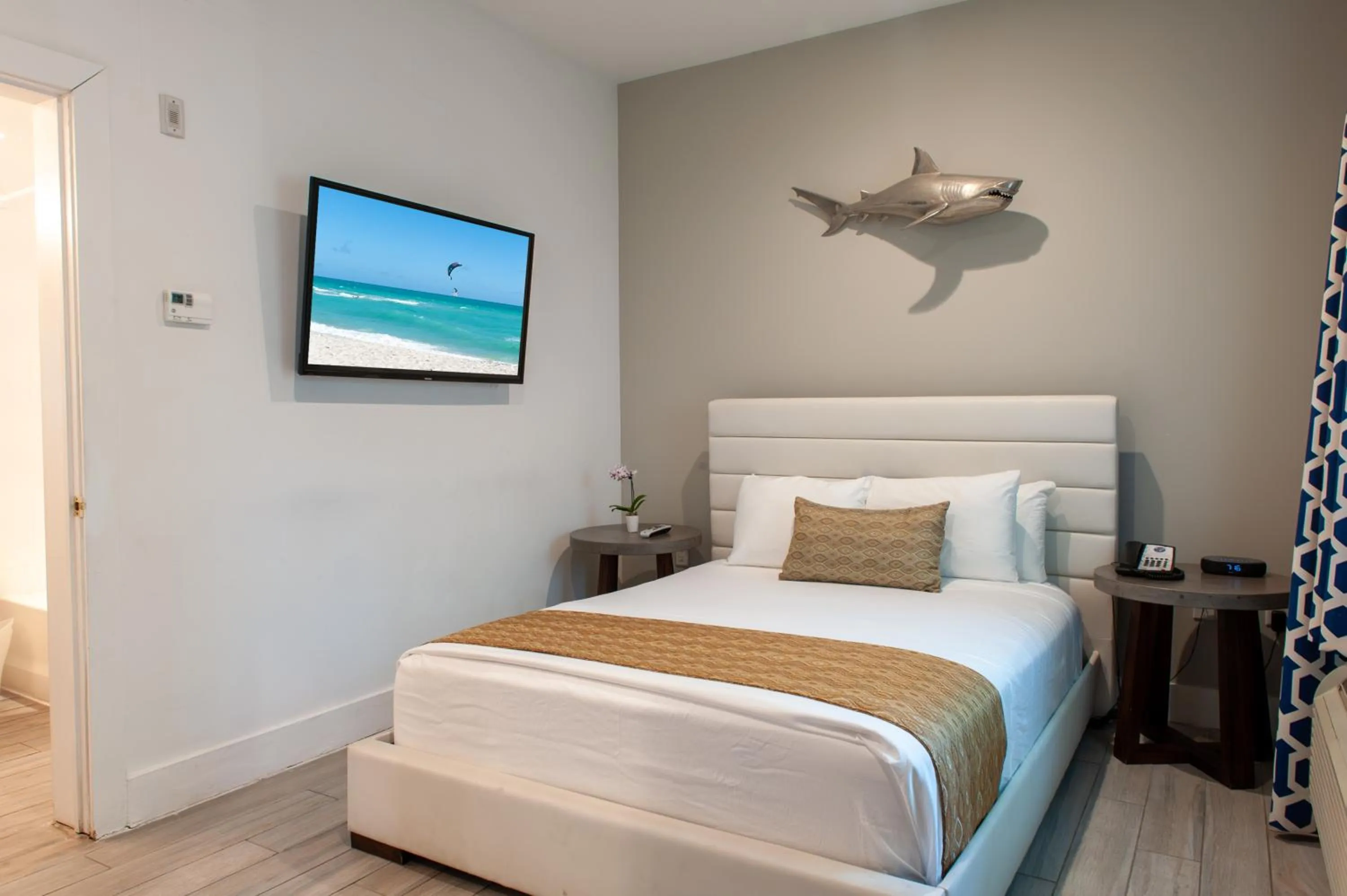 Bed in Oceanside Hotel and Suites