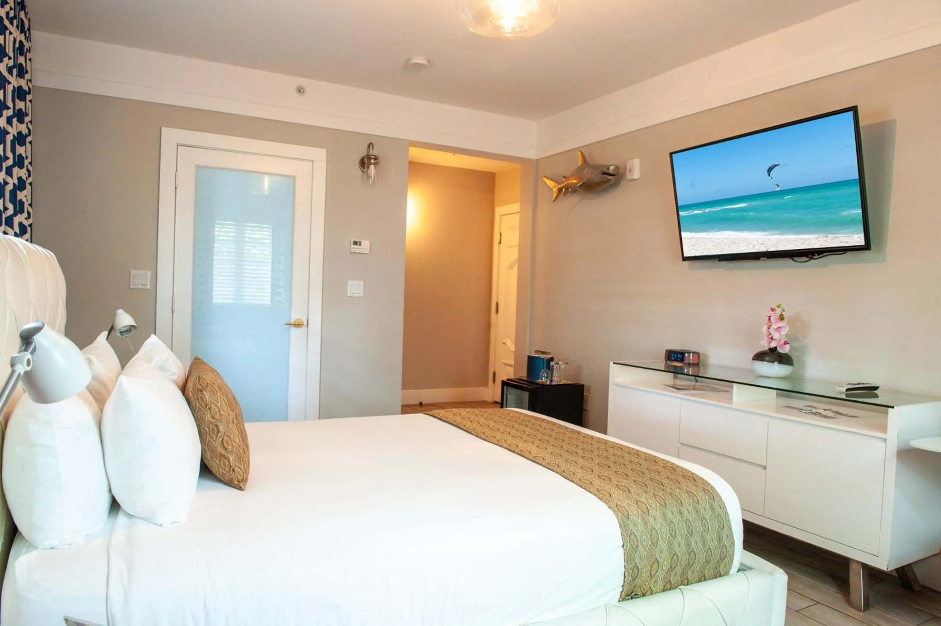 Bed in Oceanside Hotel and Suites