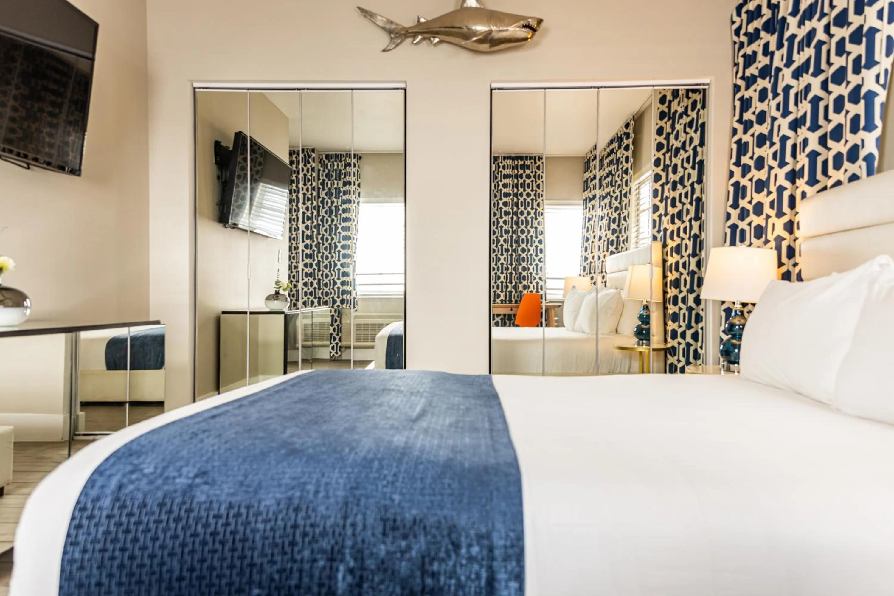 Bed in Oceanside Hotel and Suites