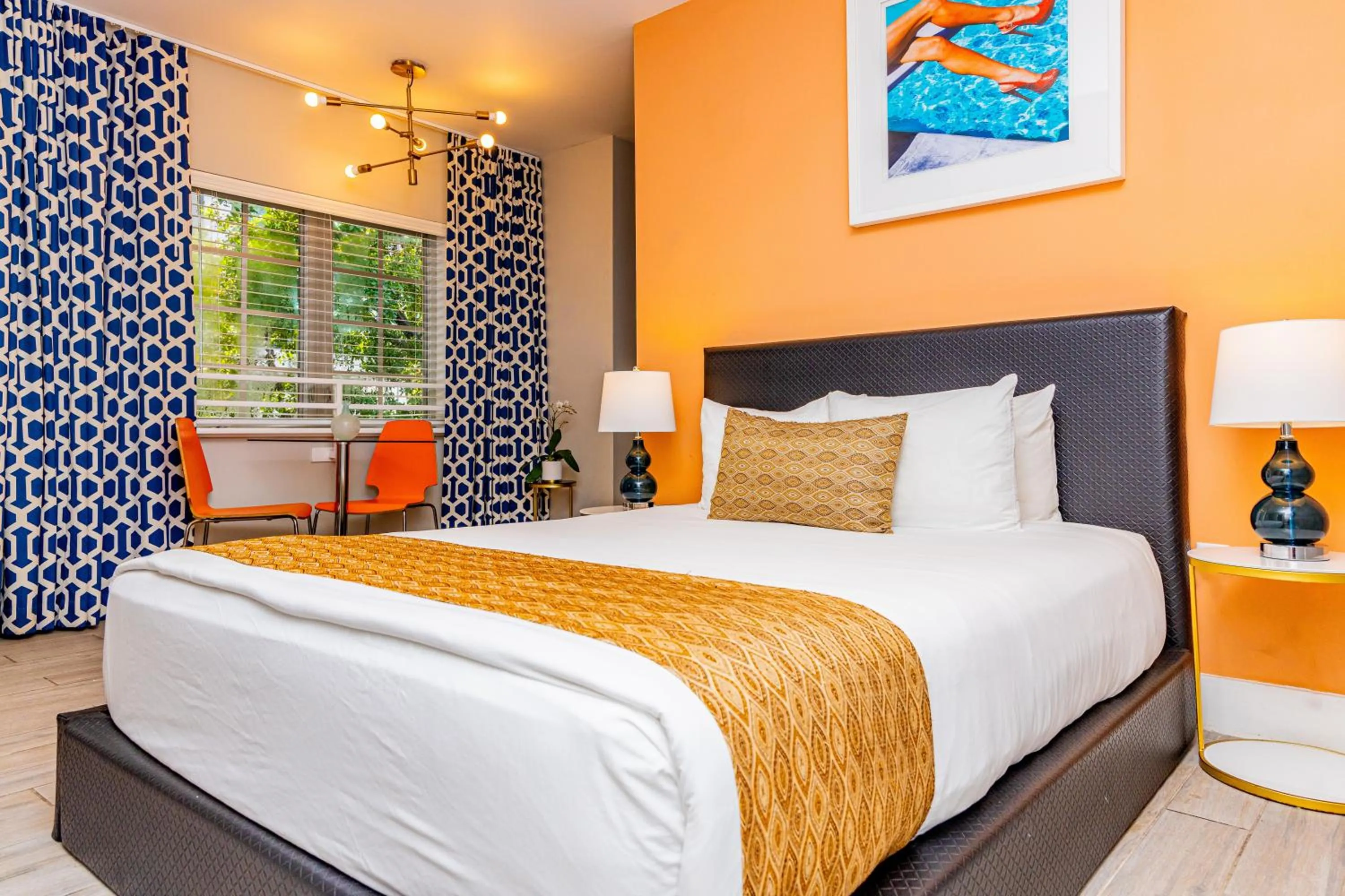 Bed in Oceanside Hotel and Suites