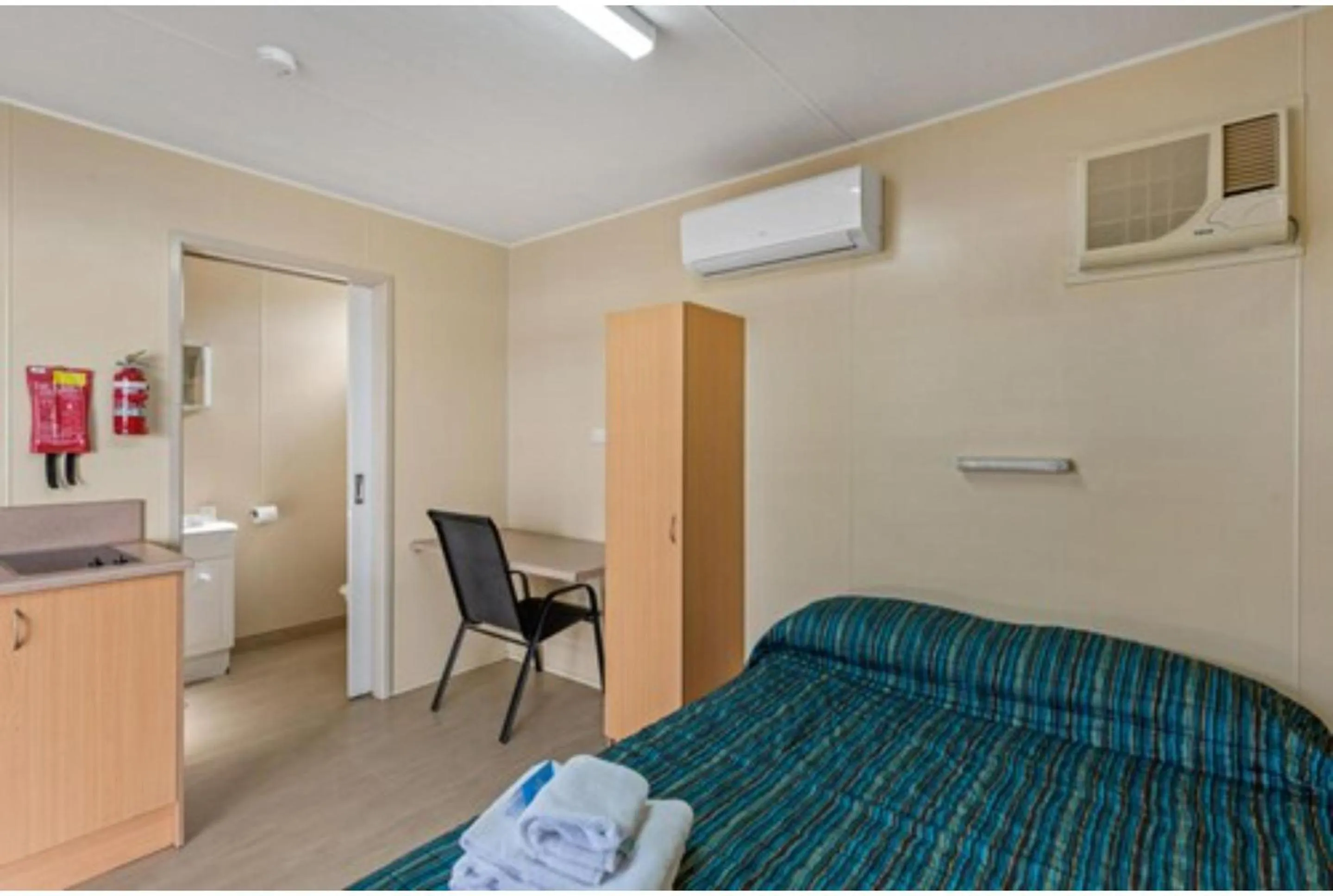 Bed in Blackwater Central Motel