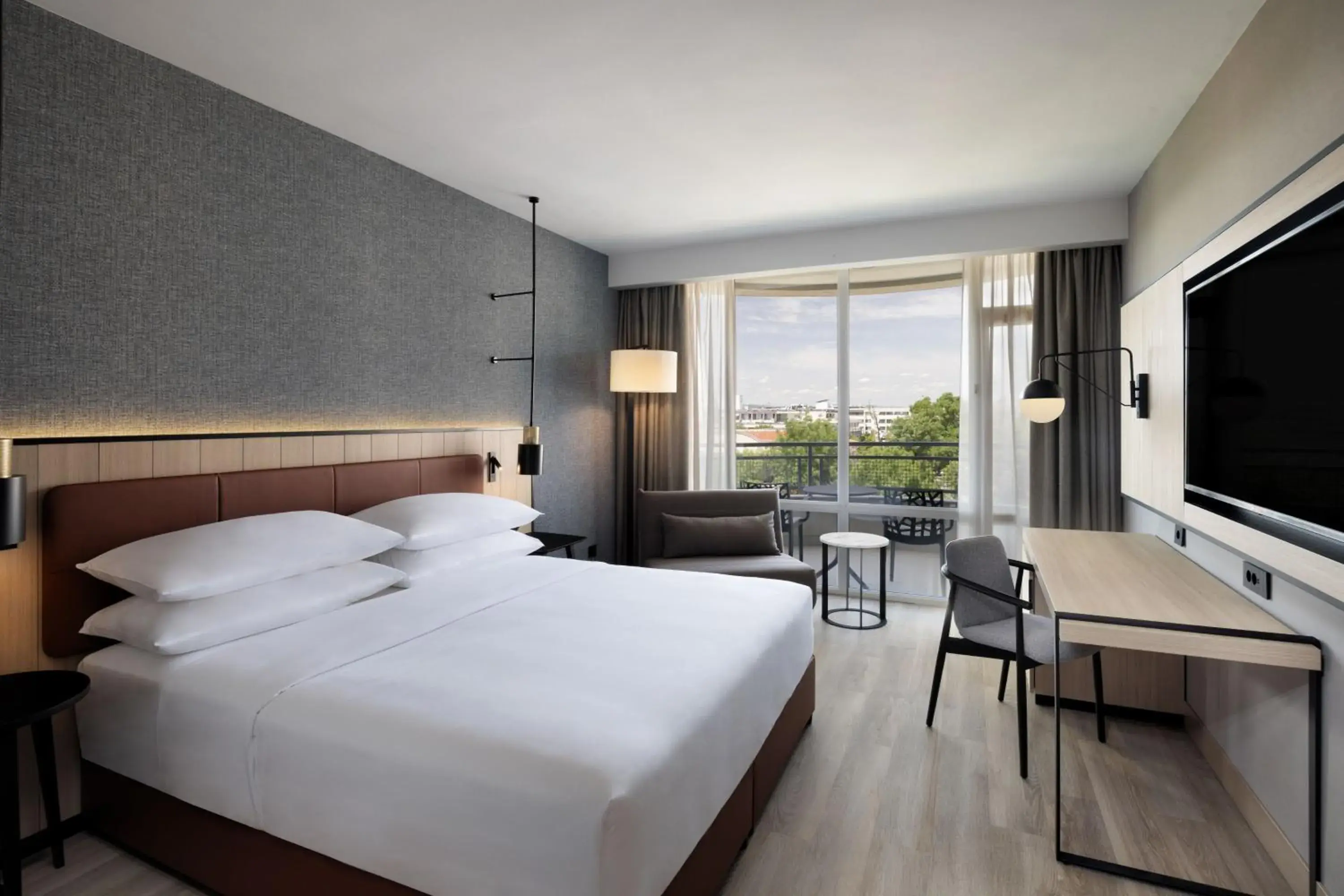 Deluxe King Room with Fold-out Chair and City View in Four Points by Sheraton Sunny Beach Deluxe King Room with Fold-out Chair and City View in Four Points by Sheraton Sunny Beach