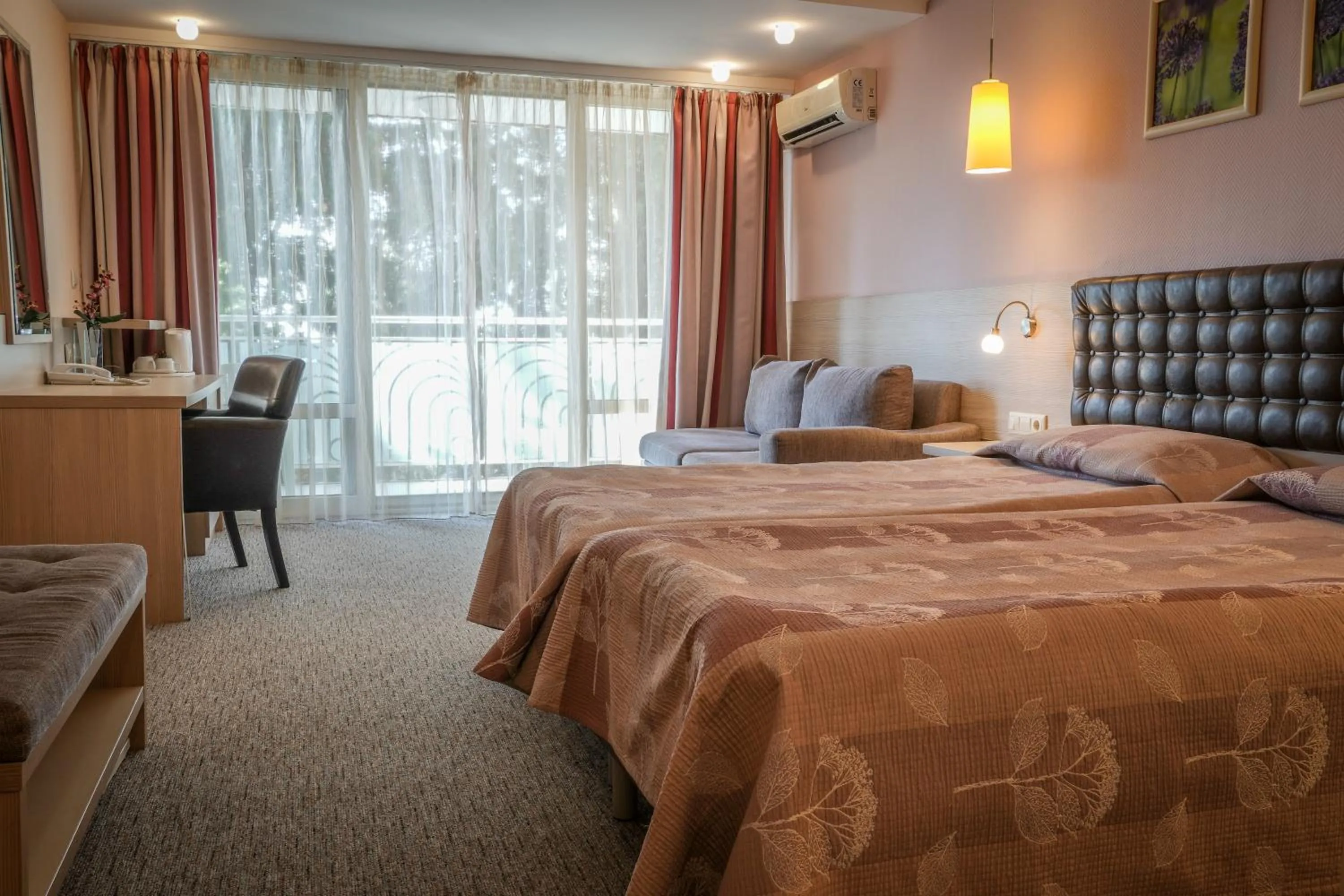 Bed in Hotel Sandy Beach