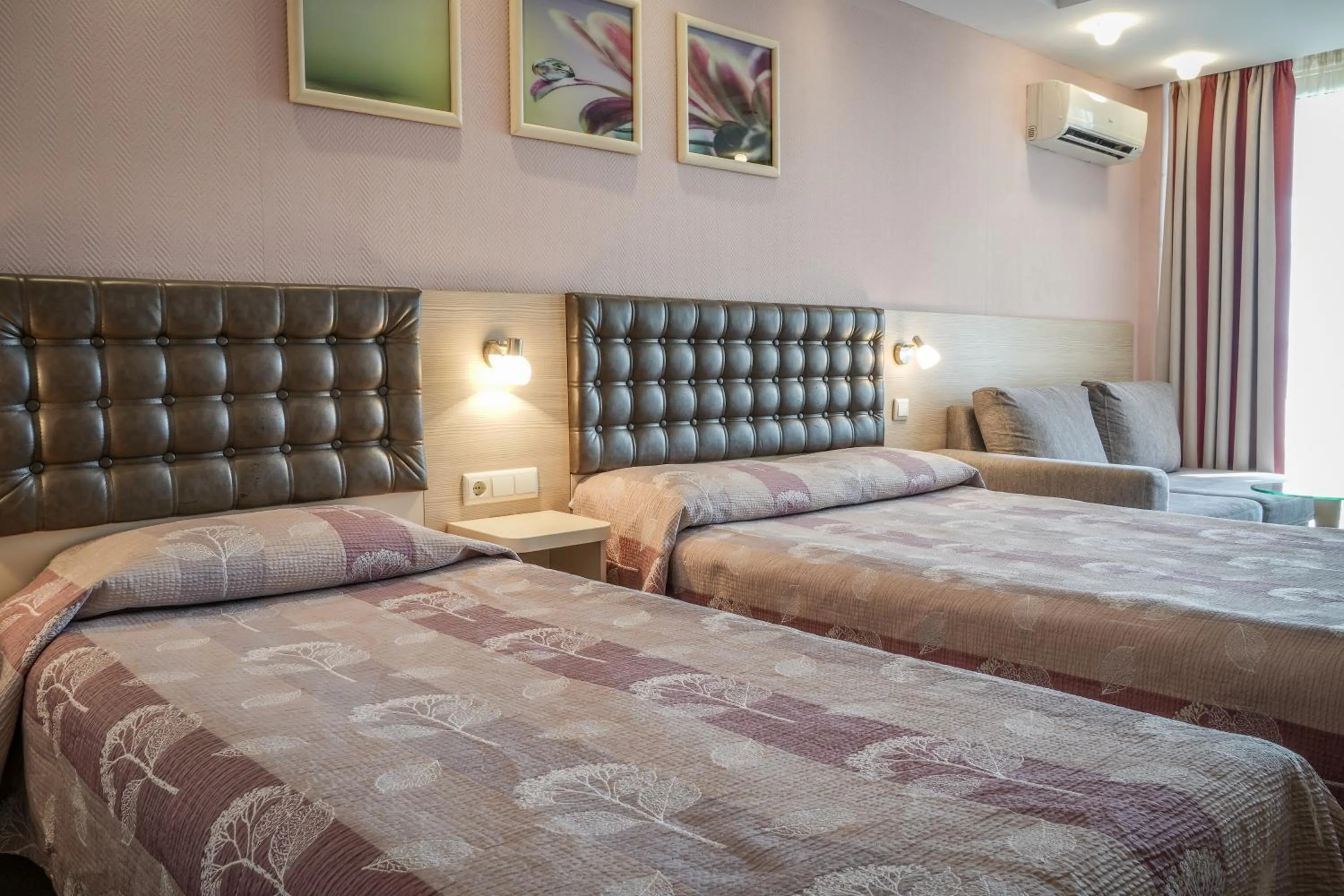 Bed in Hotel Sandy Beach