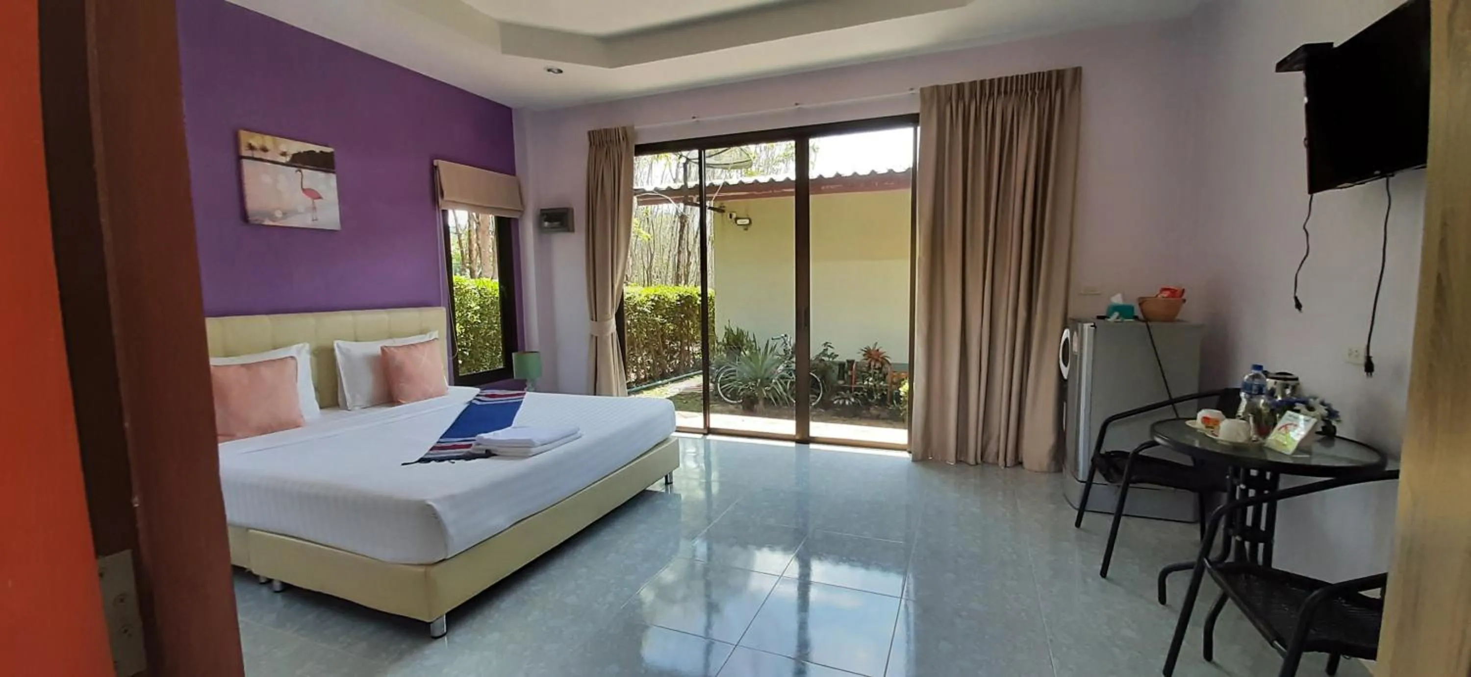 Photo of the whole room, Bed in Phuket Sirinapha Resort
