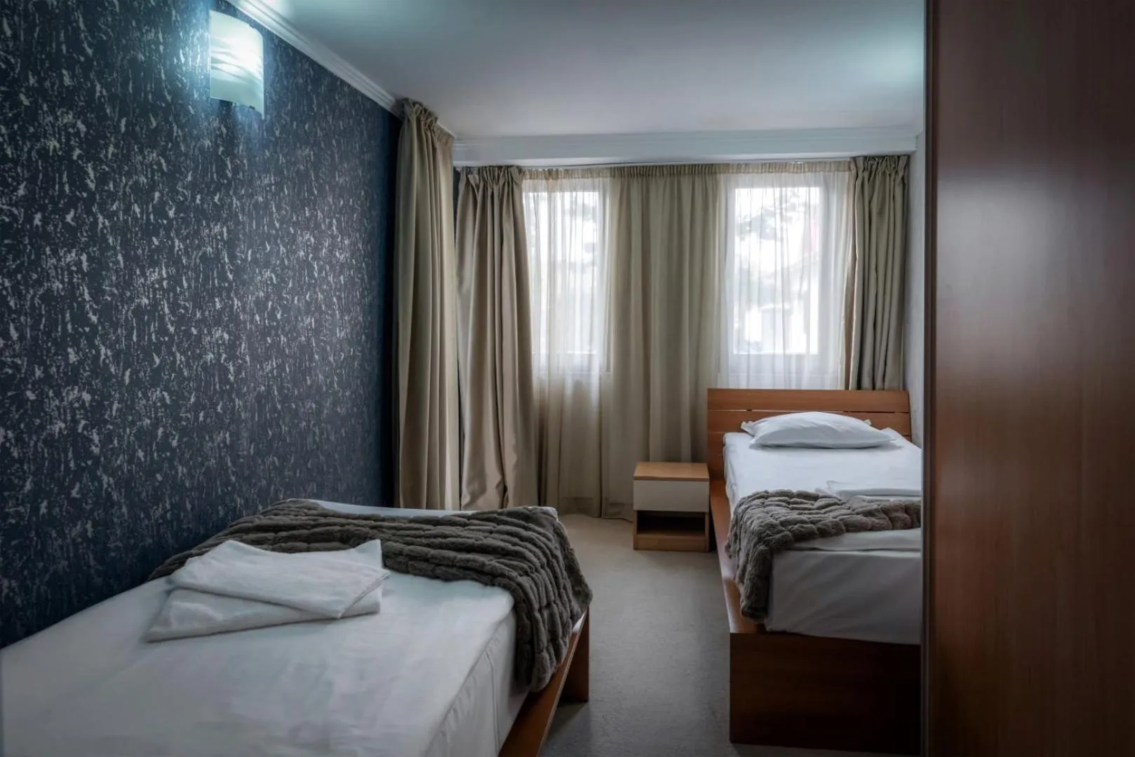 Bed in Snezhanka Hotel Pamporovo - Half Board & Swimming pool