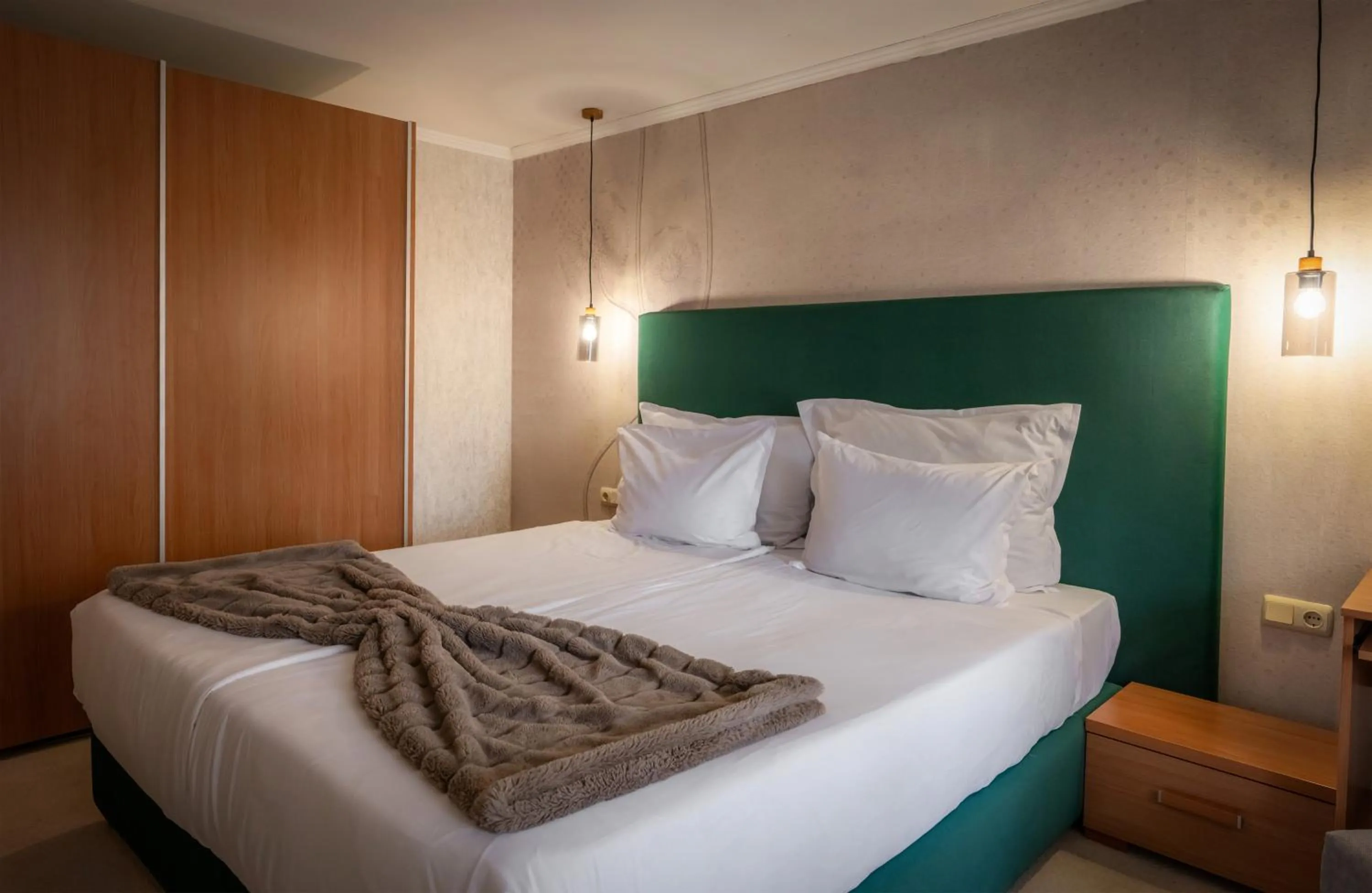 Bed in Snezhanka Hotel Pamporovo - Half Board & Swimming pool
