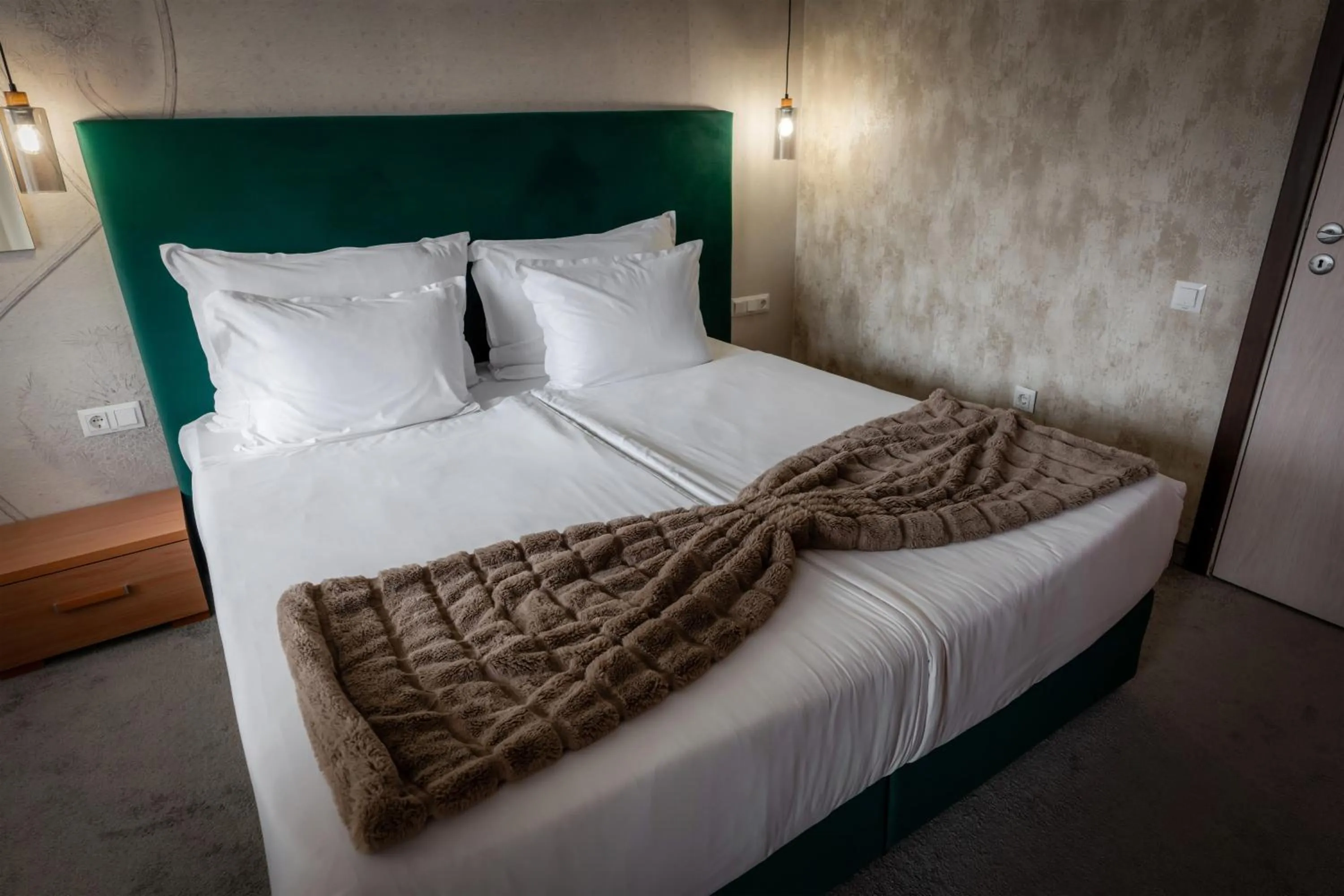 Bed in Snezhanka Hotel Pamporovo - Half Board & Swimming pool