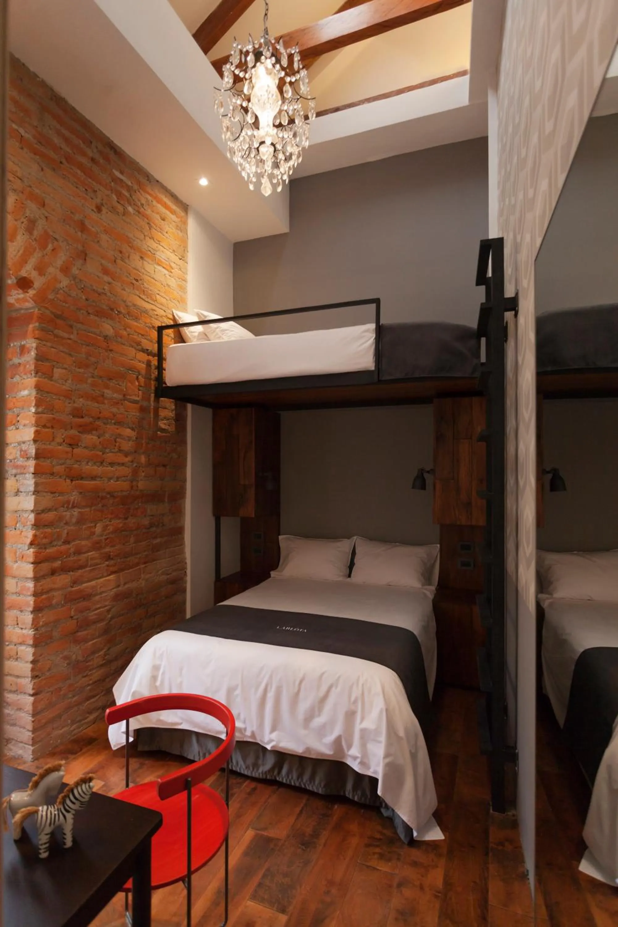 Decorative detail, Bed in Carlota Sustainable Design Hotel