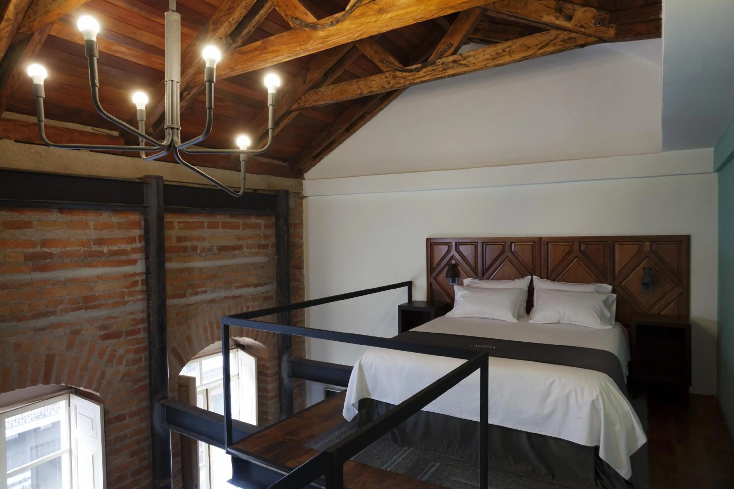 Bedroom, Bed in Carlota Sustainable Design Hotel