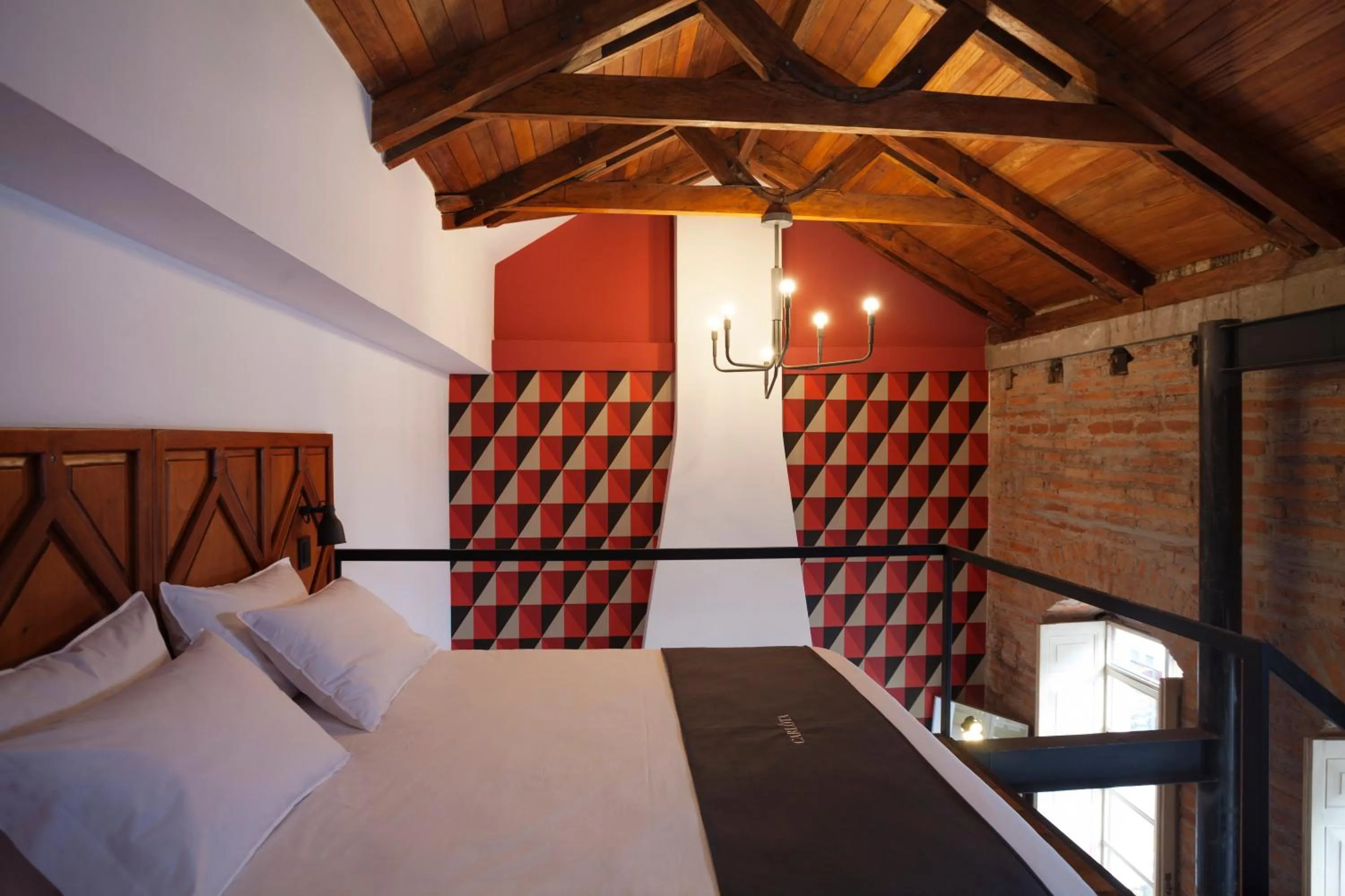 Bed in Carlota Sustainable Design Hotel