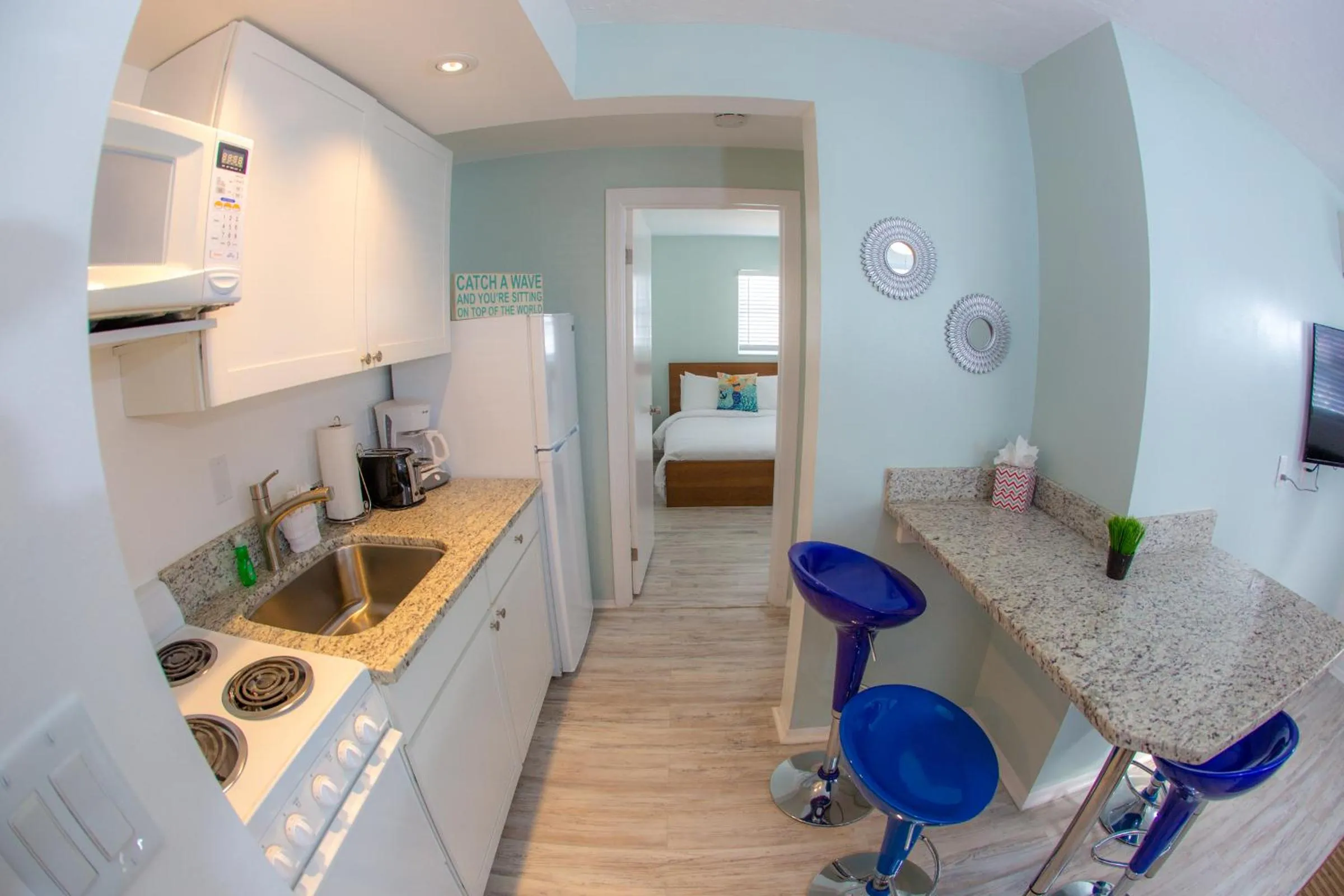 Kitchen or kitchenette in St. Pete Beach Suites