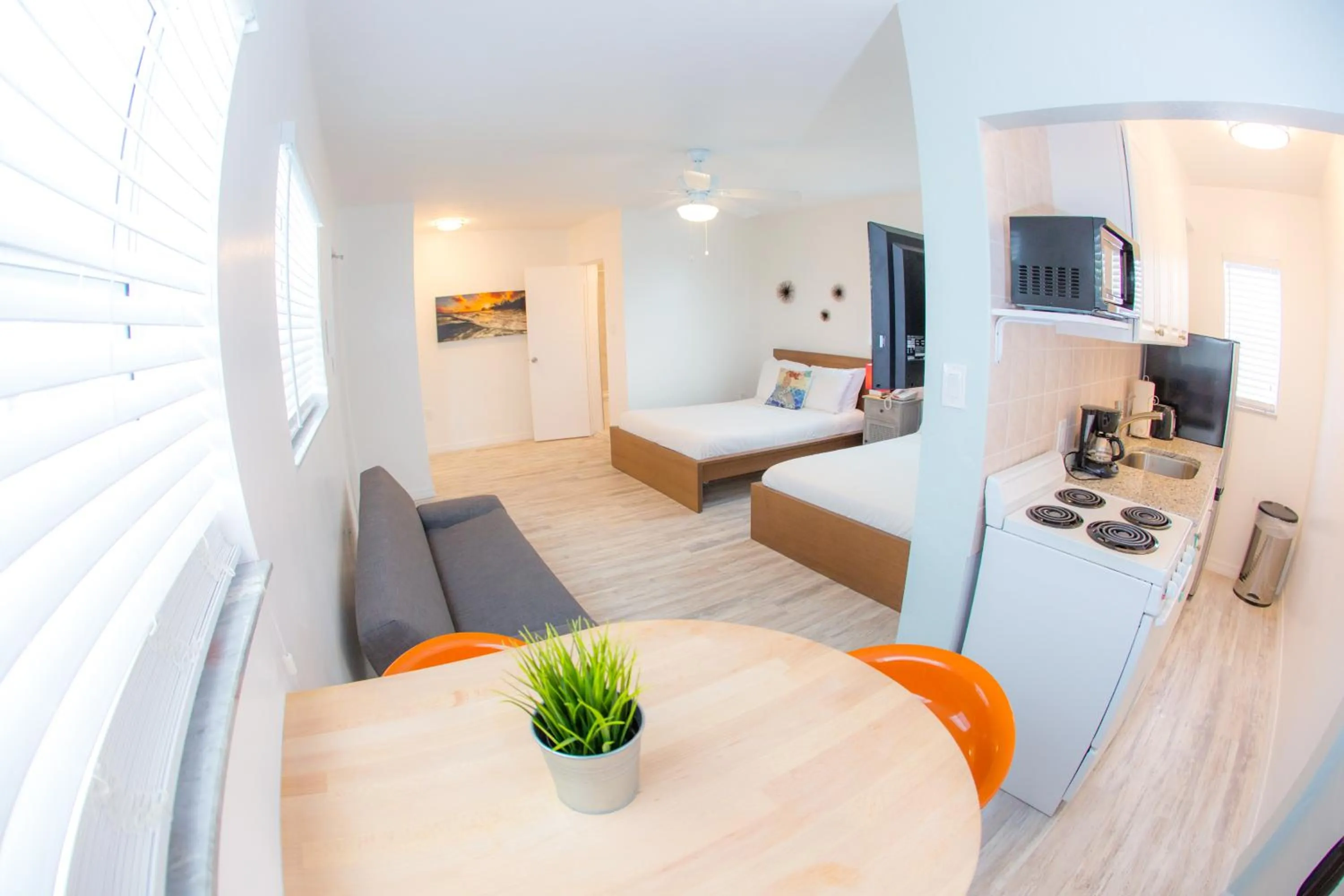 Seating area, Bed in St. Pete Beach Suites