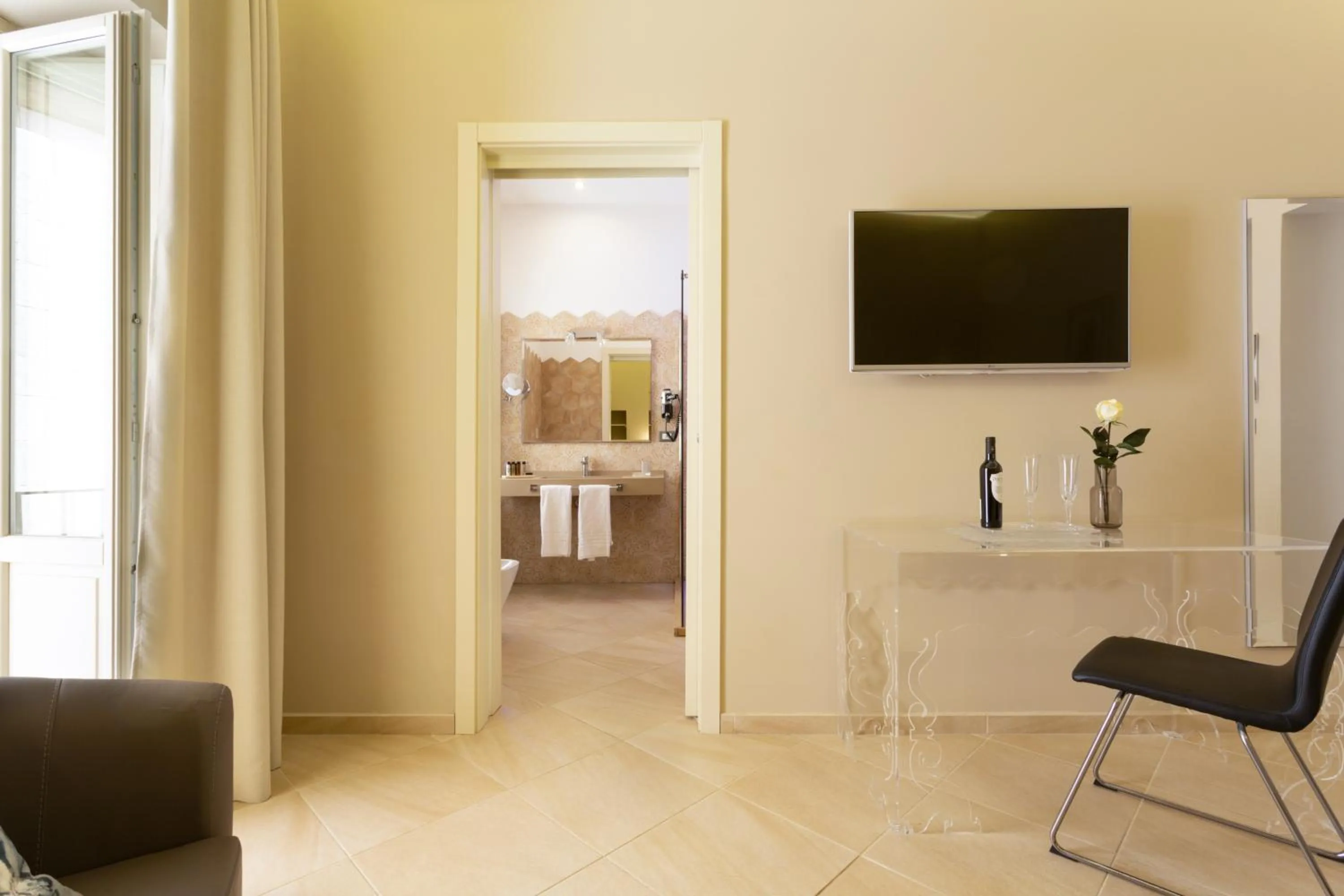 Photo of the whole room in Maecò Ortigia B&B - Hospitality & Charming Rooms