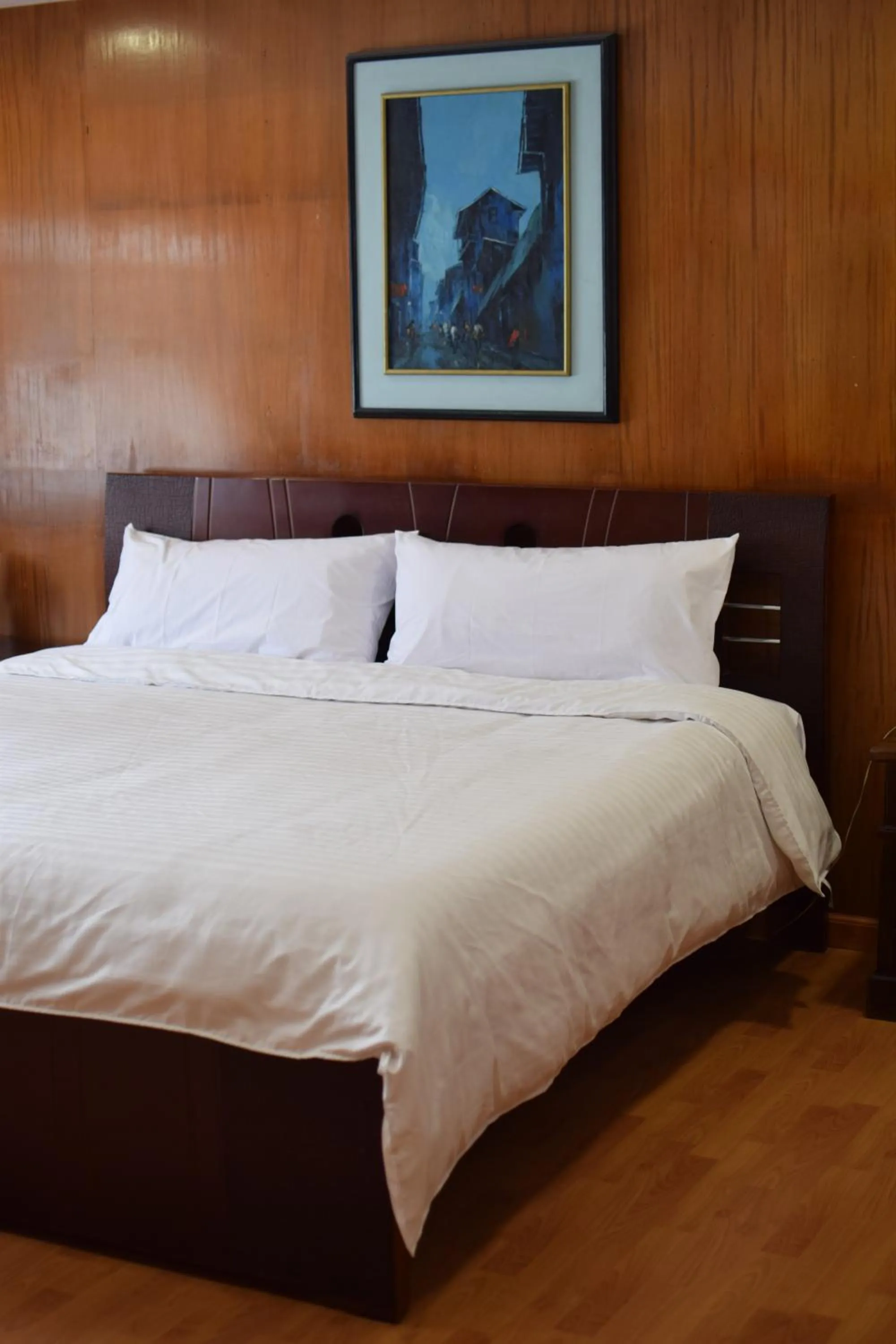 Property building, Bed in Hotel Ambassador