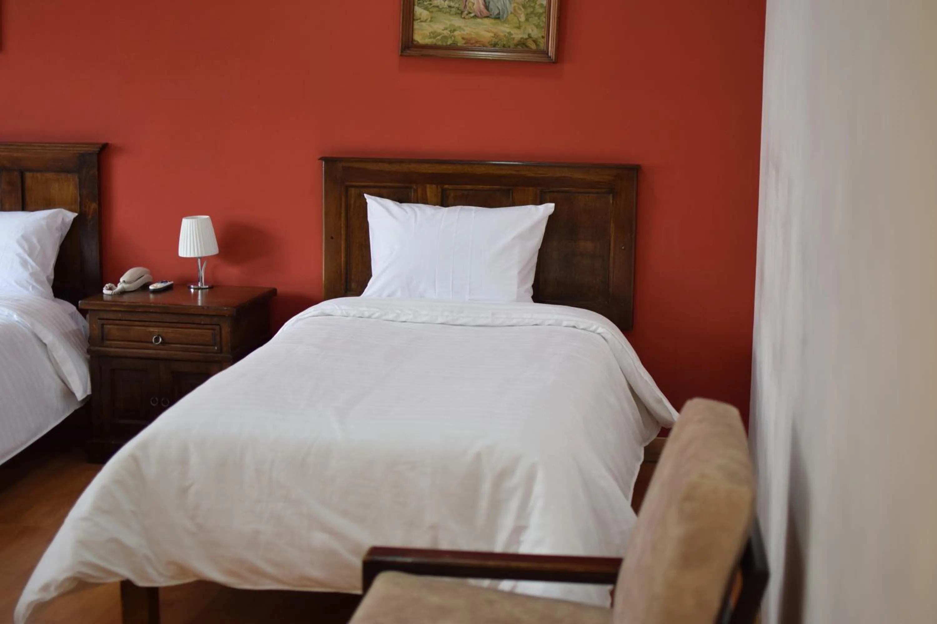 Property building, Bed in Hotel Ambassador