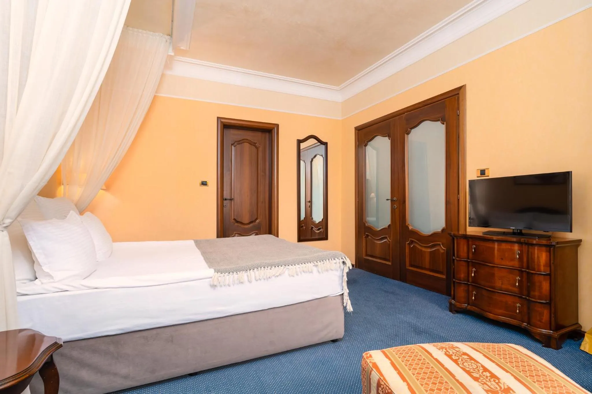 Bed in Festa Winter Palace Hotel