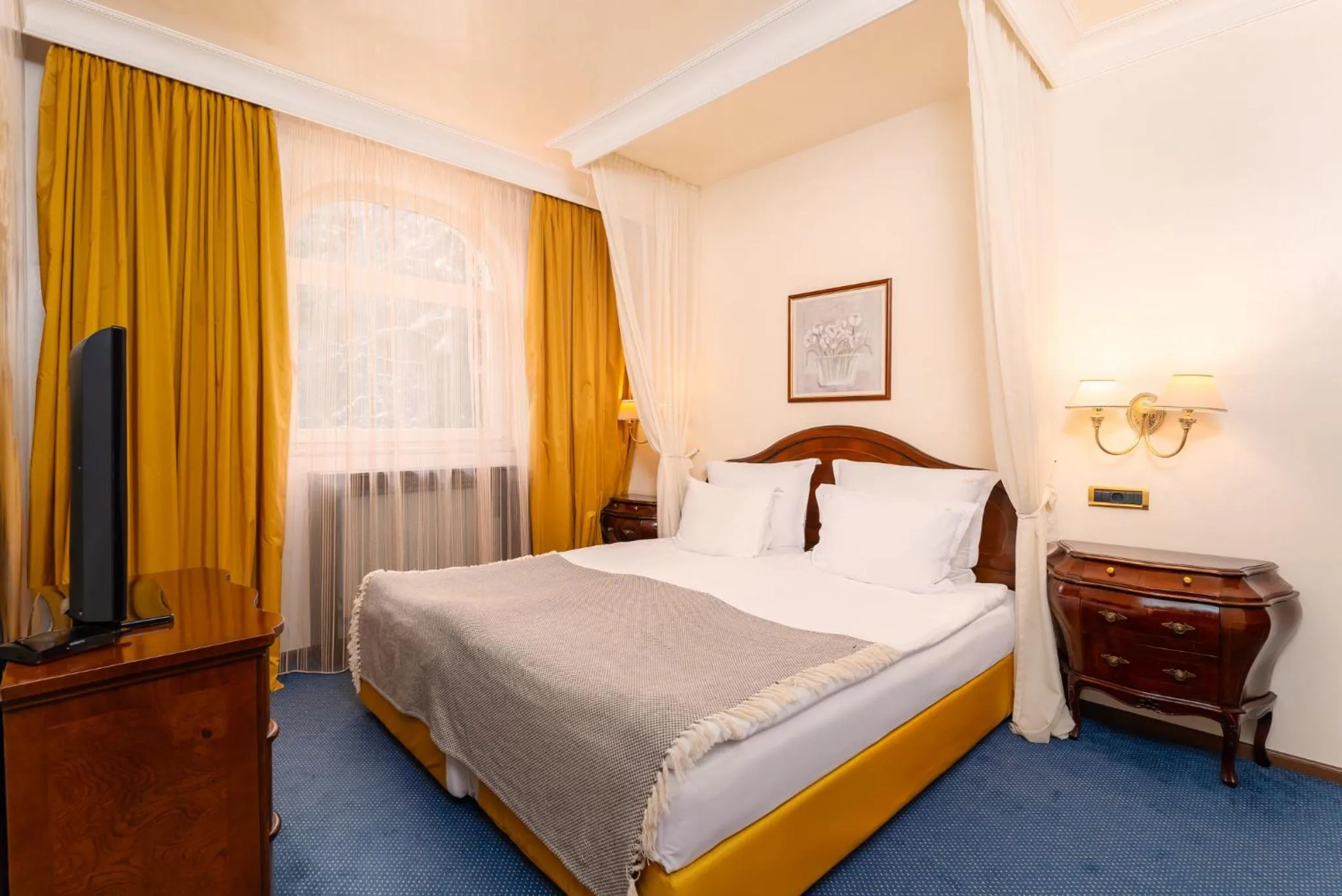 Bed in Festa Winter Palace Hotel