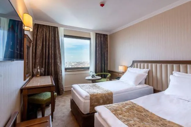 Bed in Astoria Grand Hotel