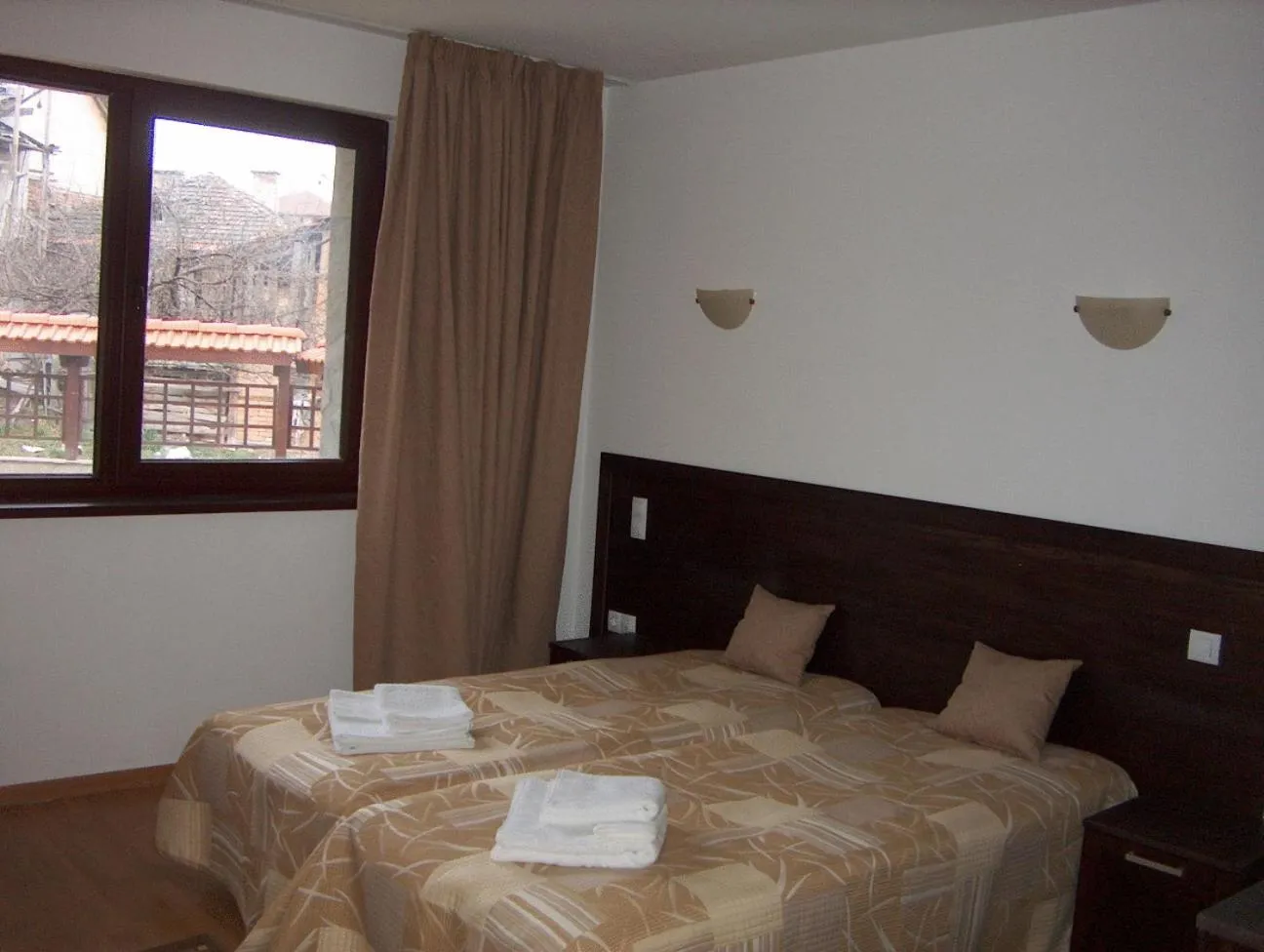 Bed in Winslow Elegance Apartments