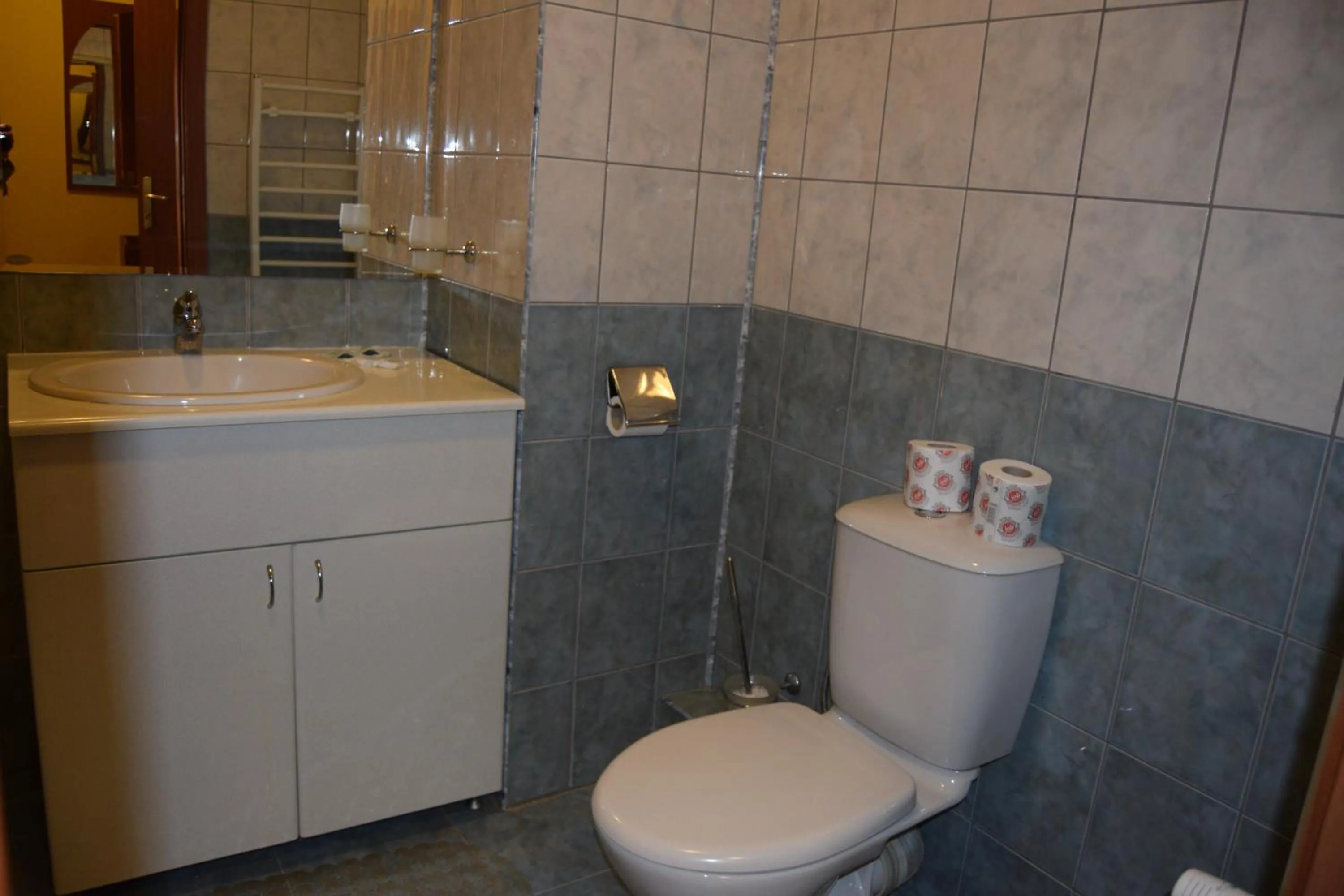 Toilet in Persey Flora Apartments