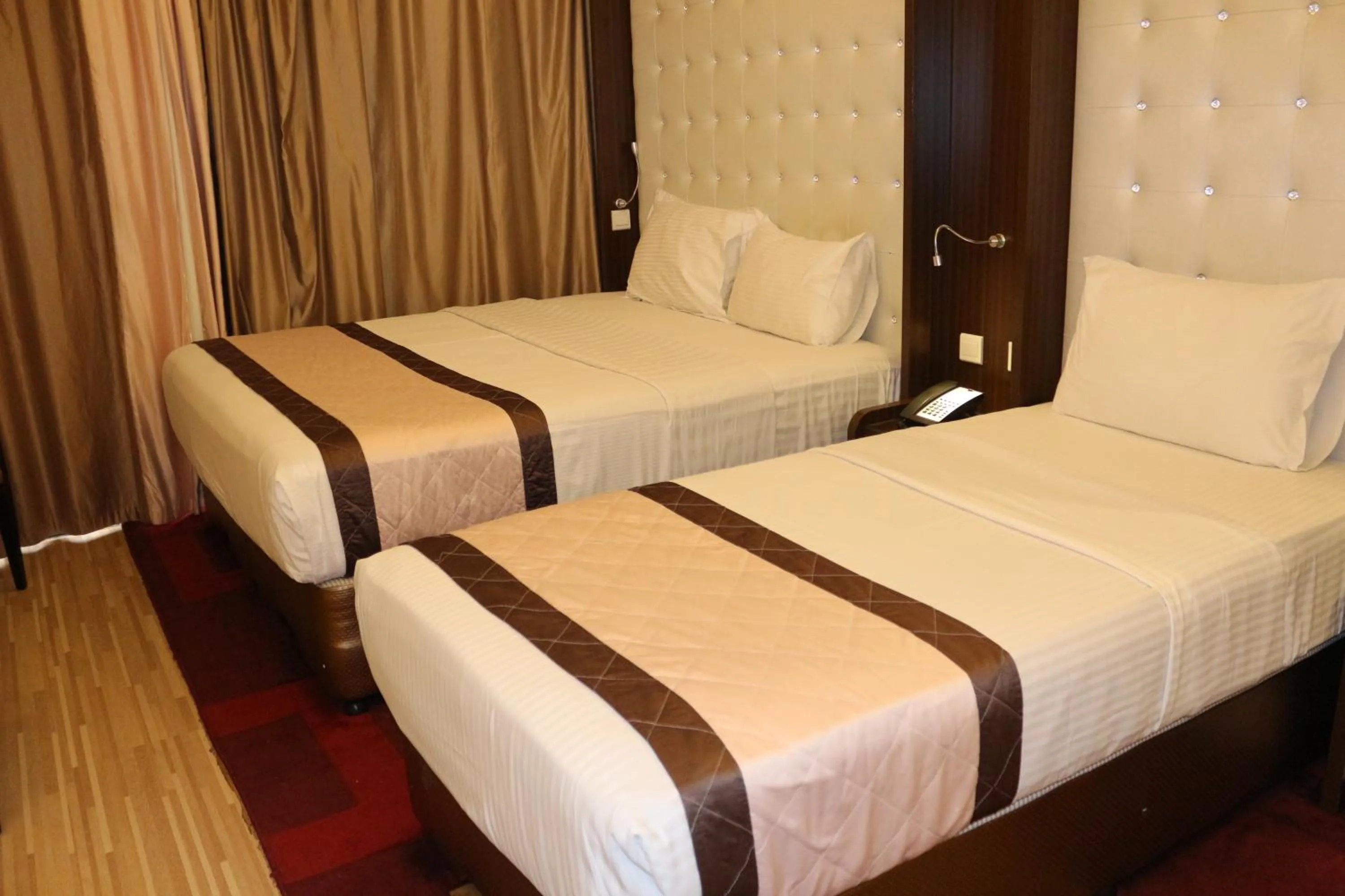 Bed in Al Khaleej Grand Hotel